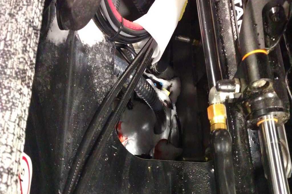 Engine compartment of 2026 Tracker Targa V-18 Combo with visible wiring and components.