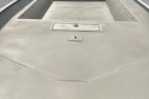 2025 Tracker GRIZZLY 2072 Utility boat interior, featuring a spacious, flat deck design.