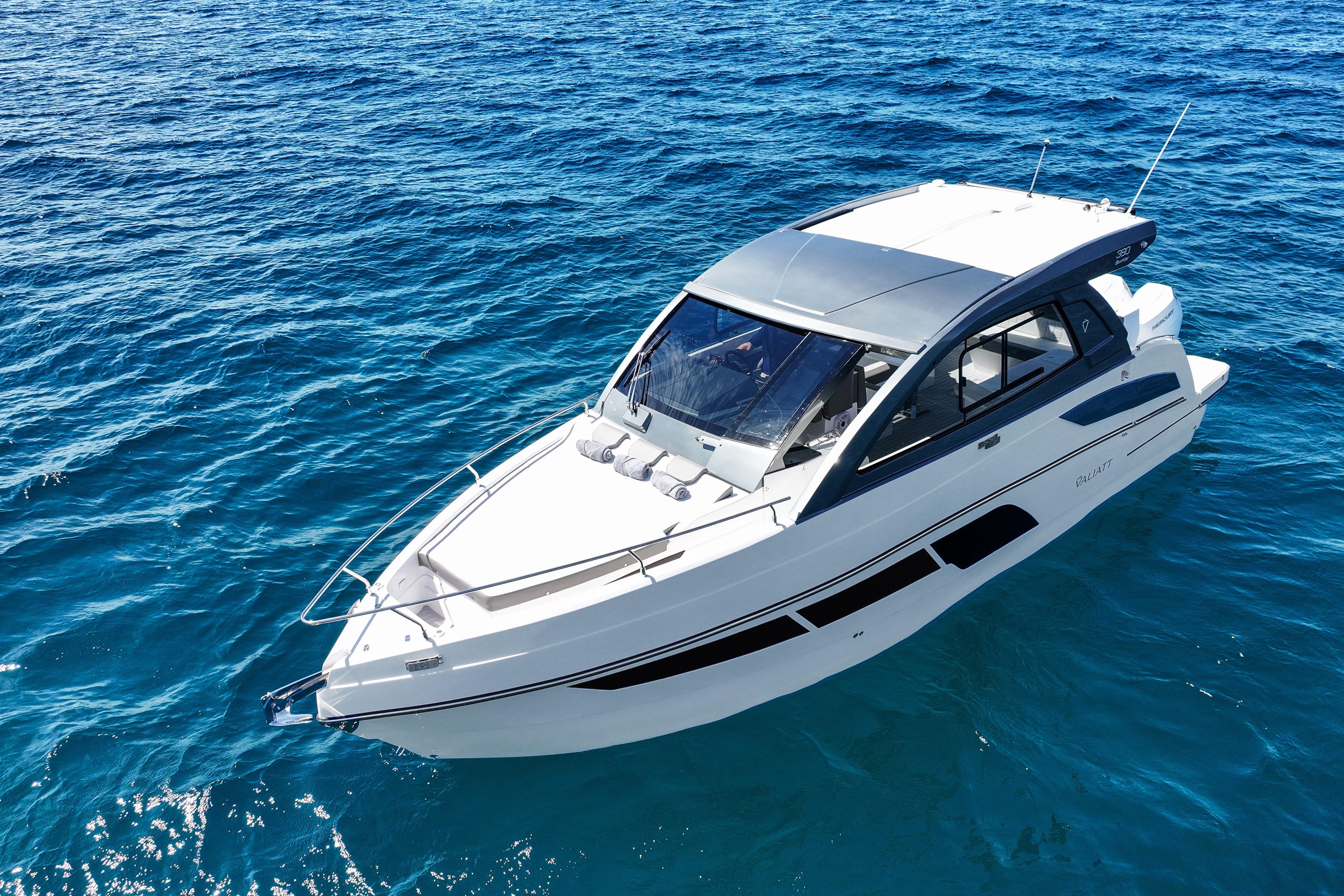 2025 VALIATT YACHTS 380 Bowrider cruising on clear blue ocean waters.