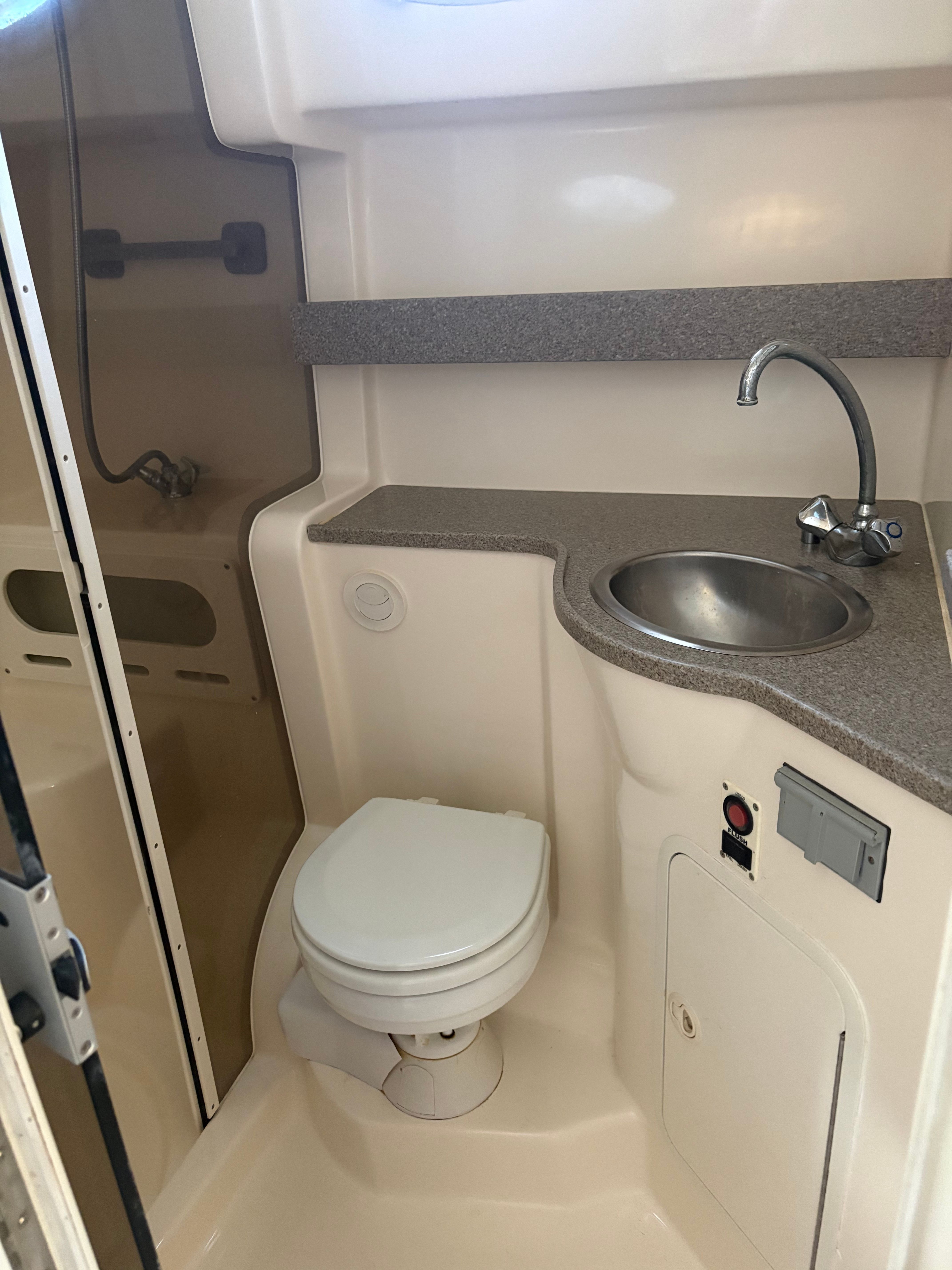 Interior of Rinker Fiesta Vee 342 yacht, bathroom view.