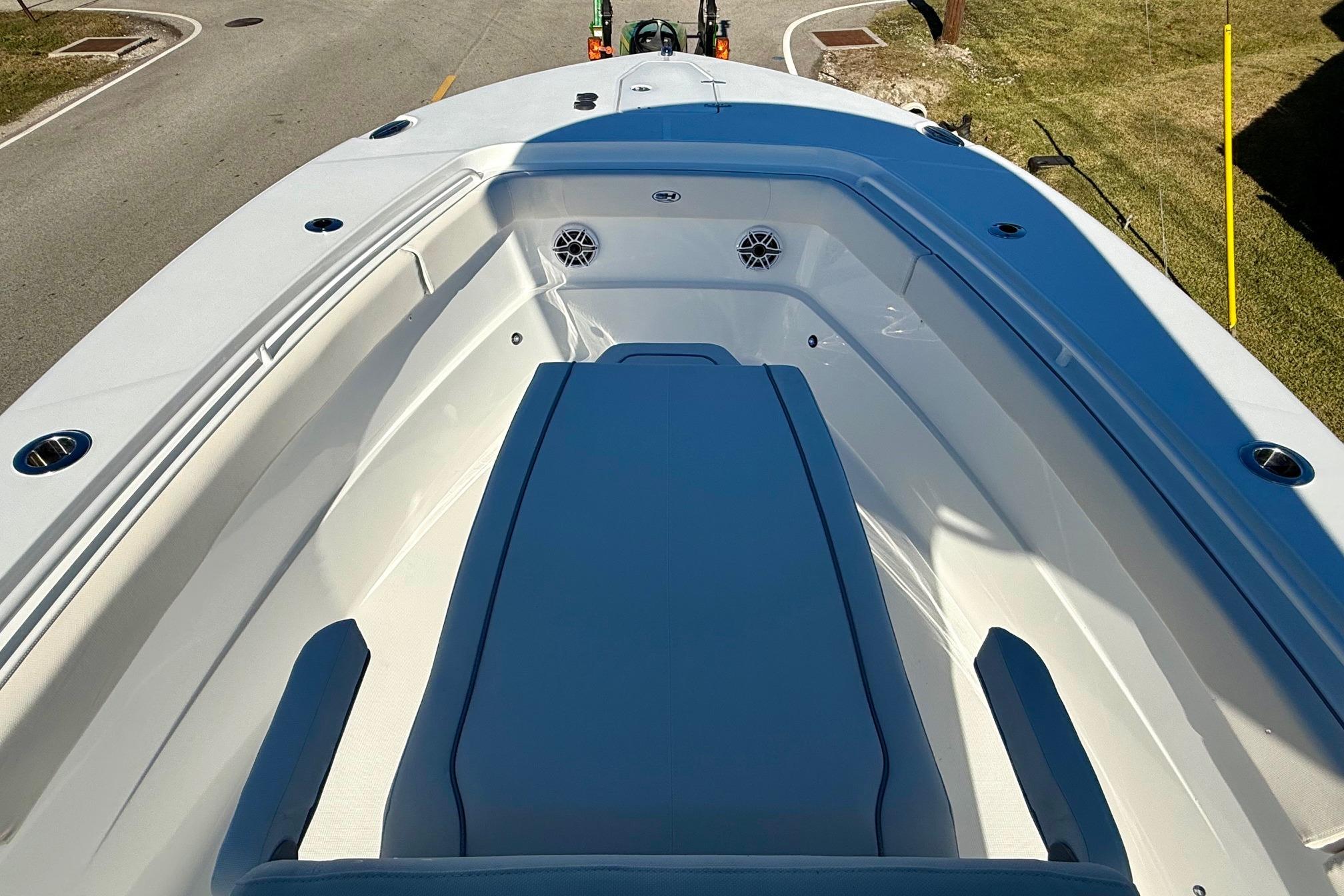 2026 Sea Hunt Ultra 275 Coffin Box boat interior with seating and speakers.
