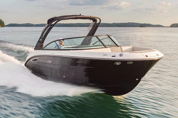 Manufacturer Provided Image: 2025 Sea Ray SDX 250 boat cruising on a lake at high speed.