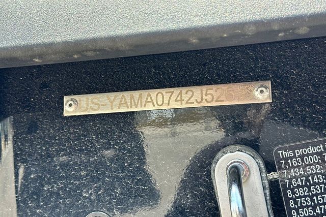 Close-up of a Yamaha WaveRunner JETBLASTER-BLACK with a serial number plate.