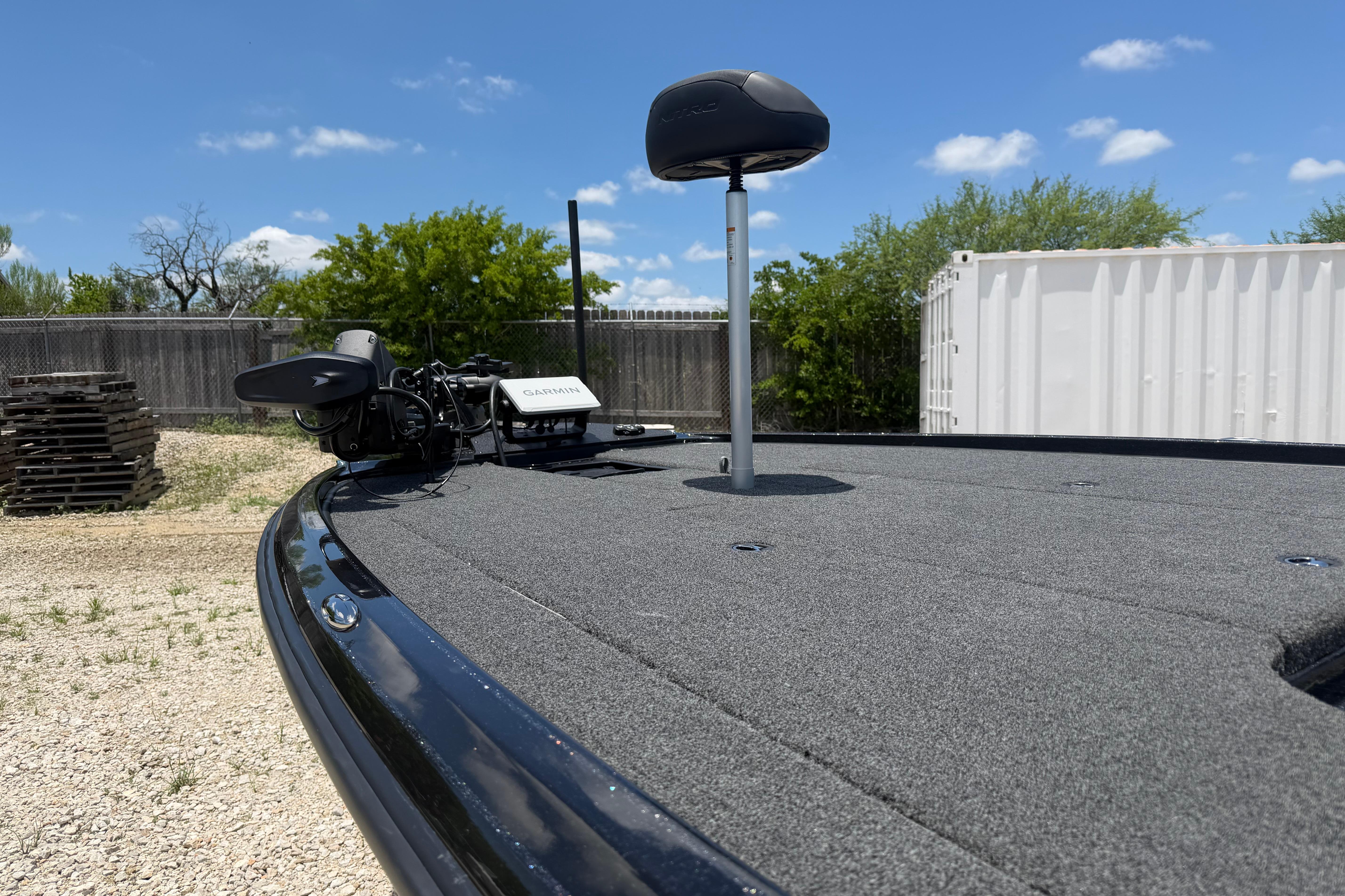 2026 Nitro Z20 XL Pro boat deck with Garmin equipment, outdoors under blue sky.