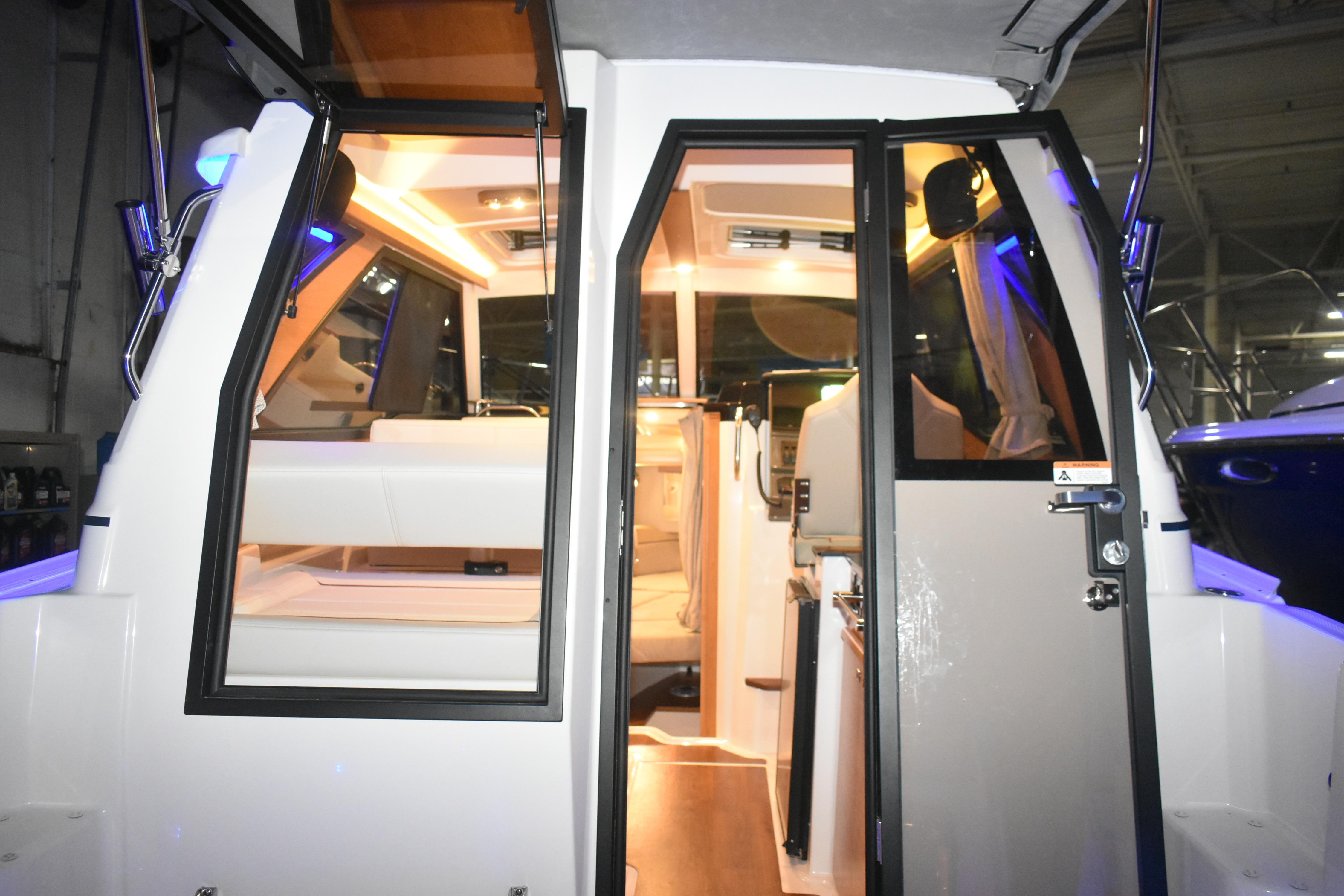 2026 Cutwater C-248 Coupe interior view with illuminated cabin and modern design.