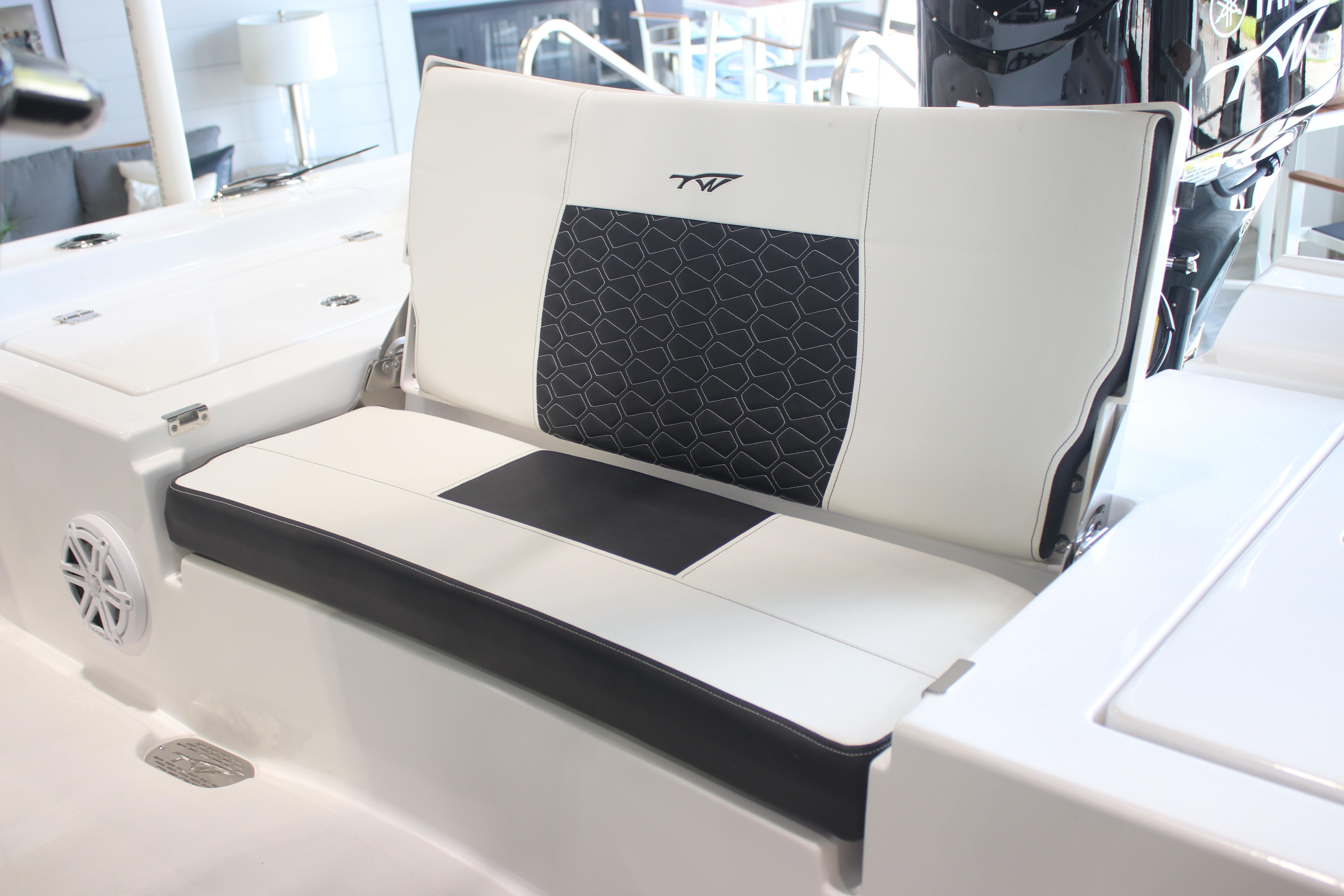2026 Tidewater 2300 Carolina Bay boat seat with stylish black and white upholstery.