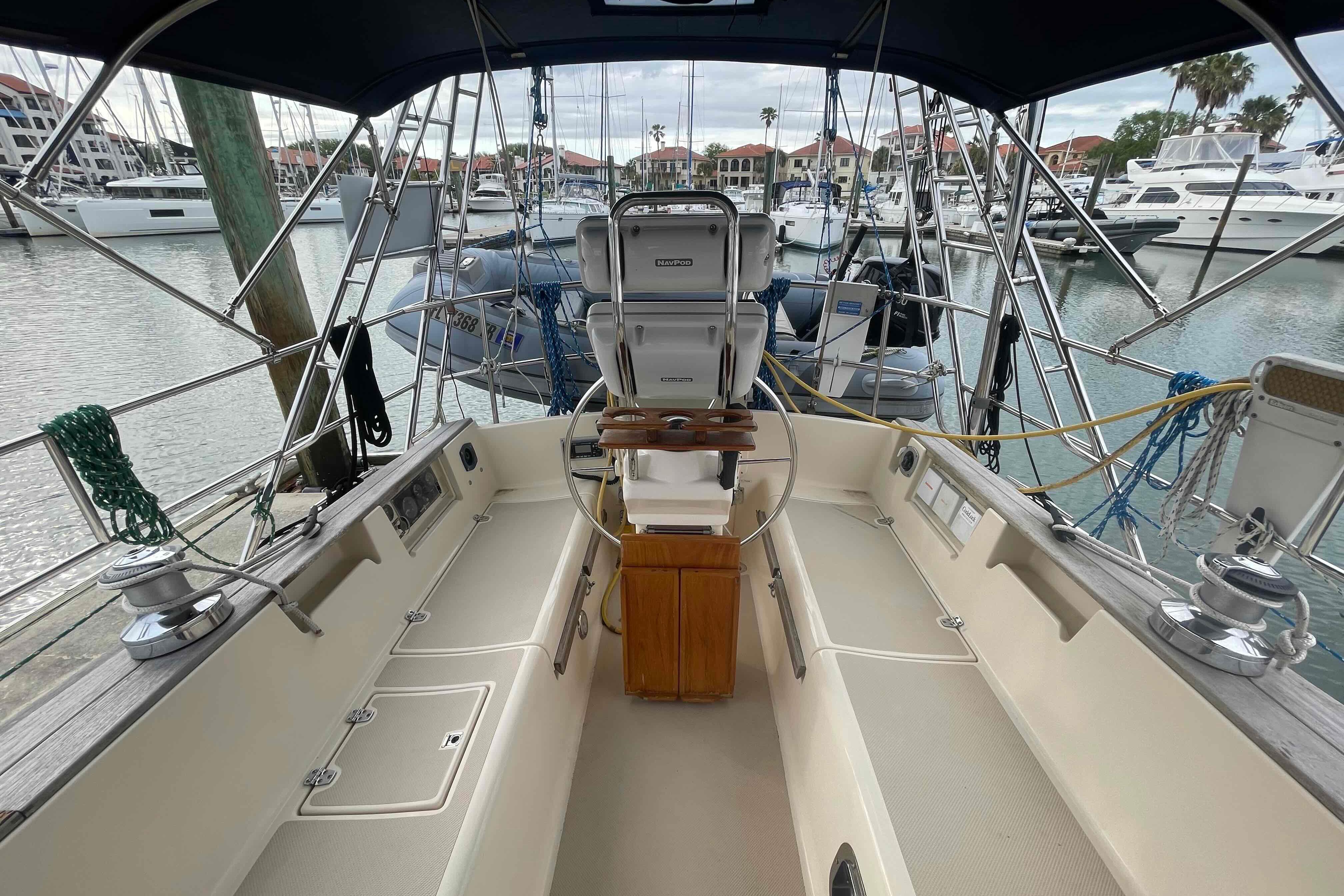 Cockpit view of 1998 Island Packet 40 sailboat docked in marina.