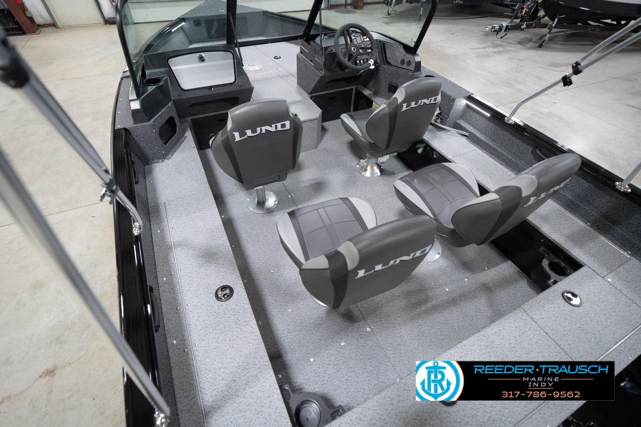 2026 Lund 1800 Explorer Sport boat interior with four seats and steering console.