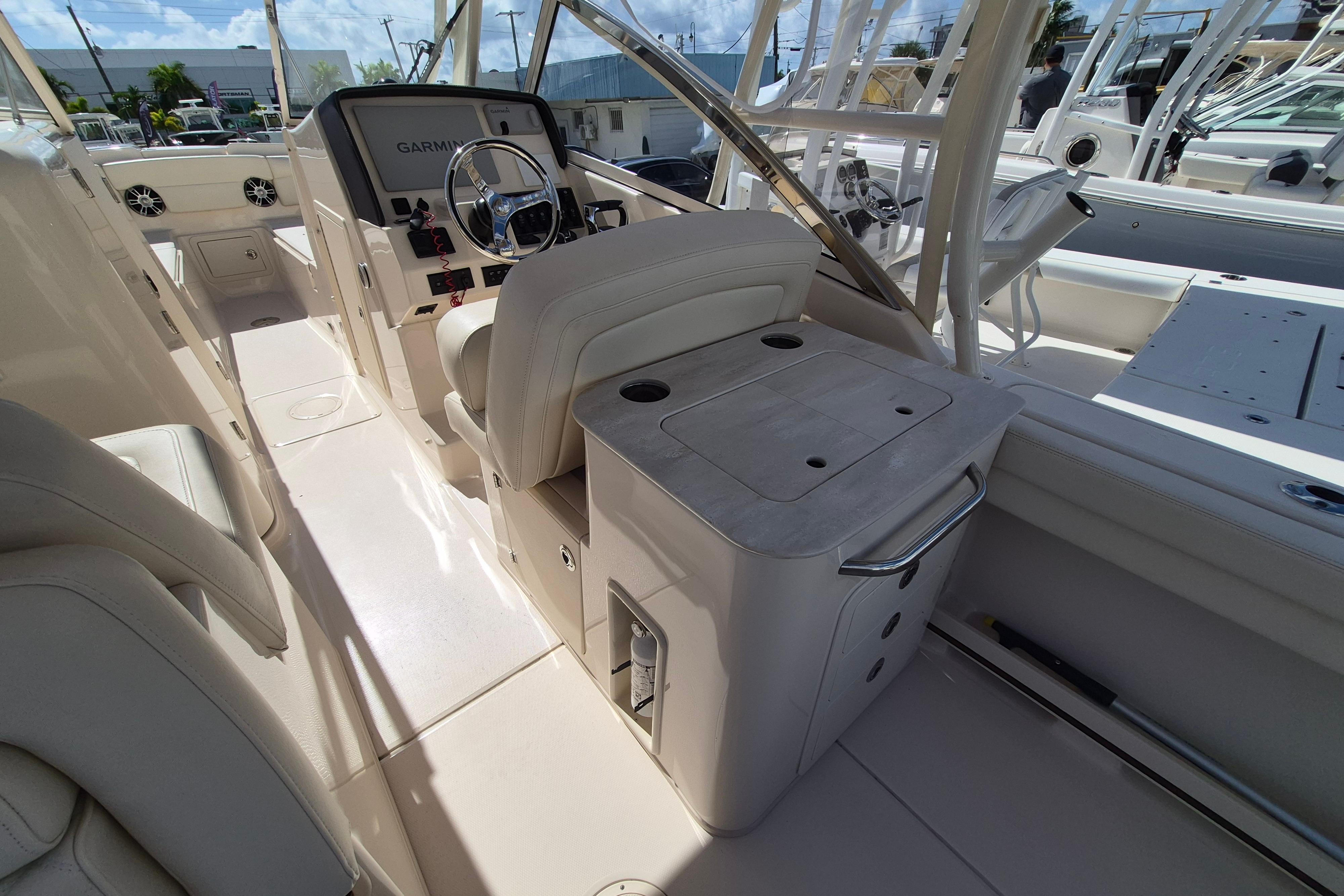 2025 Grady-White Freedom 275 boat interior with helm and seating area.
