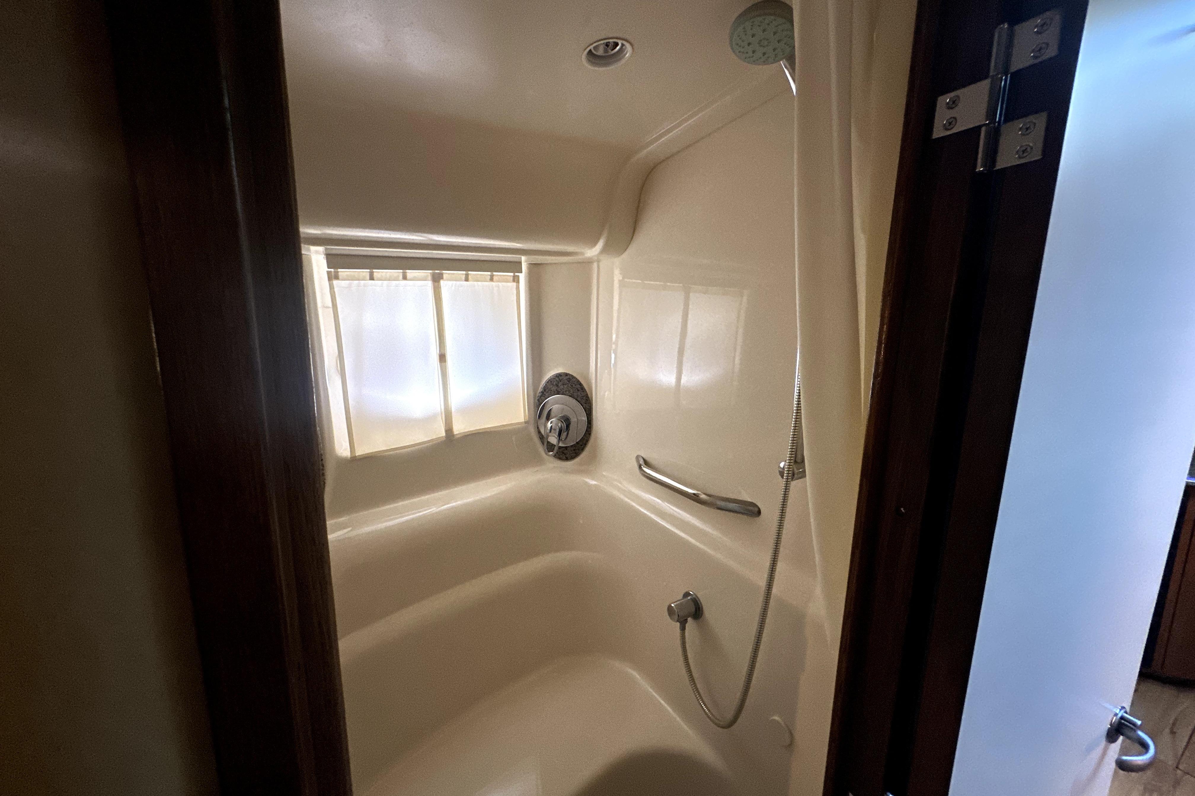 Shower area in 2007 Sea Ray 44 Sundancer yacht, featuring a sleek, compact design.