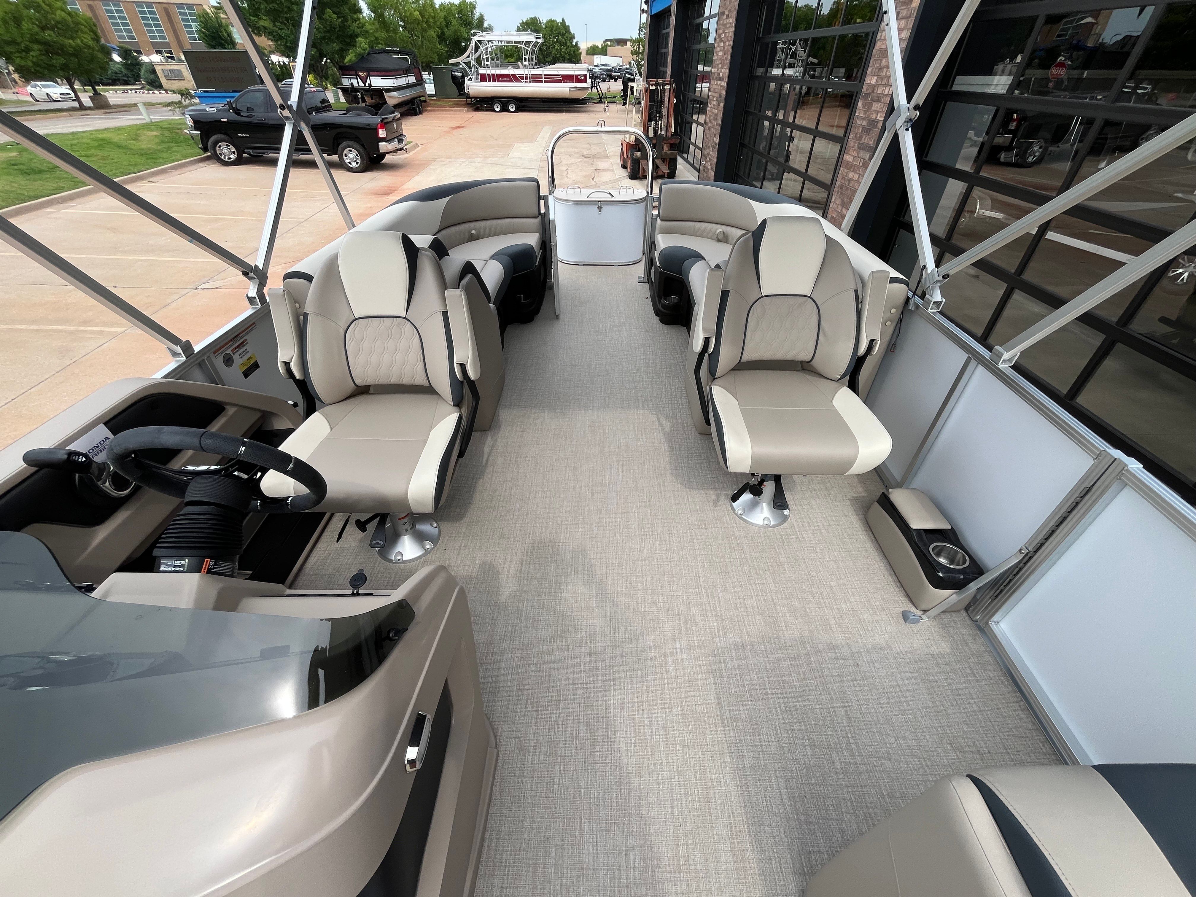 Interior of 2025 Tahoe LTZ QL pontoon boat with luxurious seating.