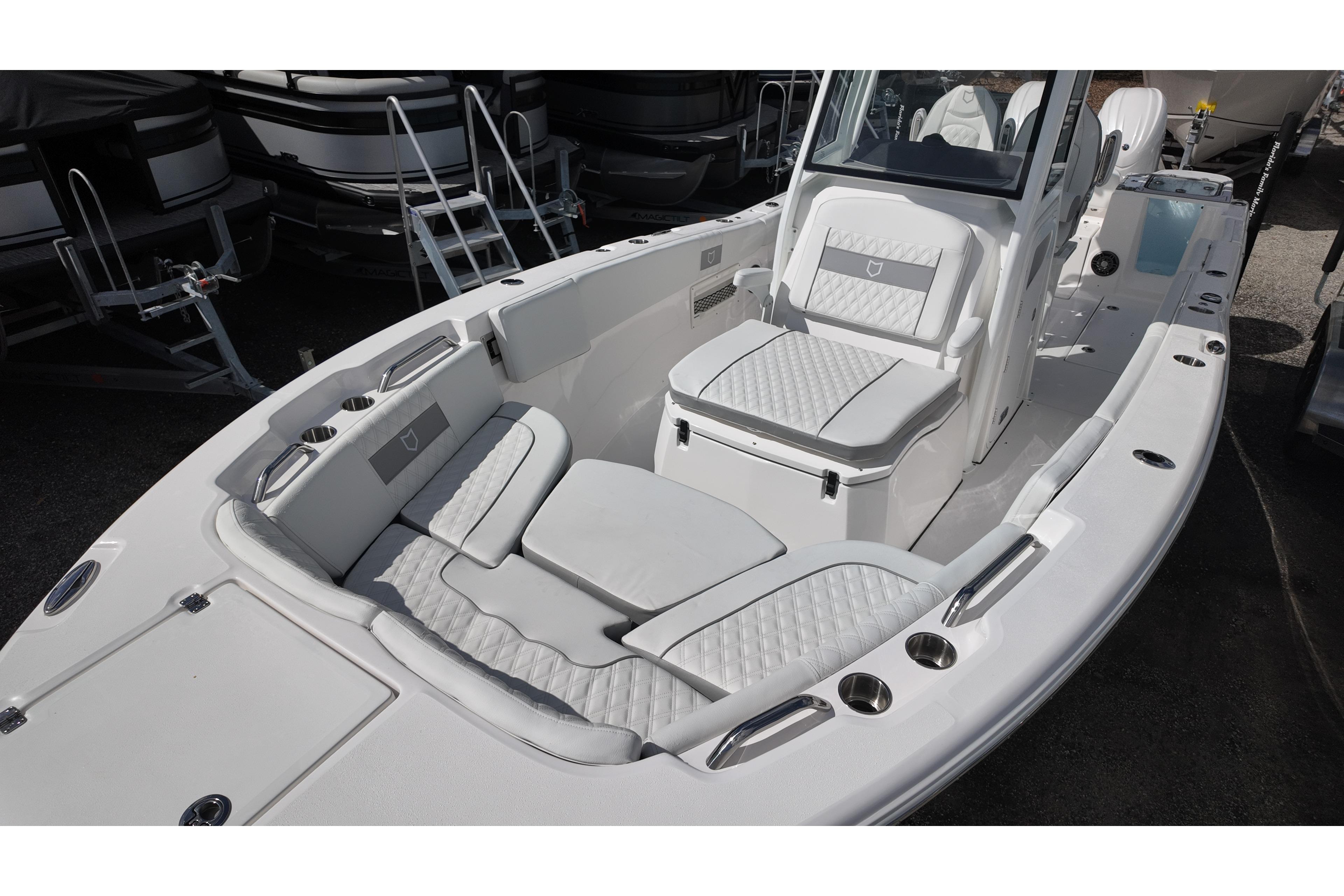 2026 Sea Fox 268 Commander boat interior with cushioned seating and modern design.
