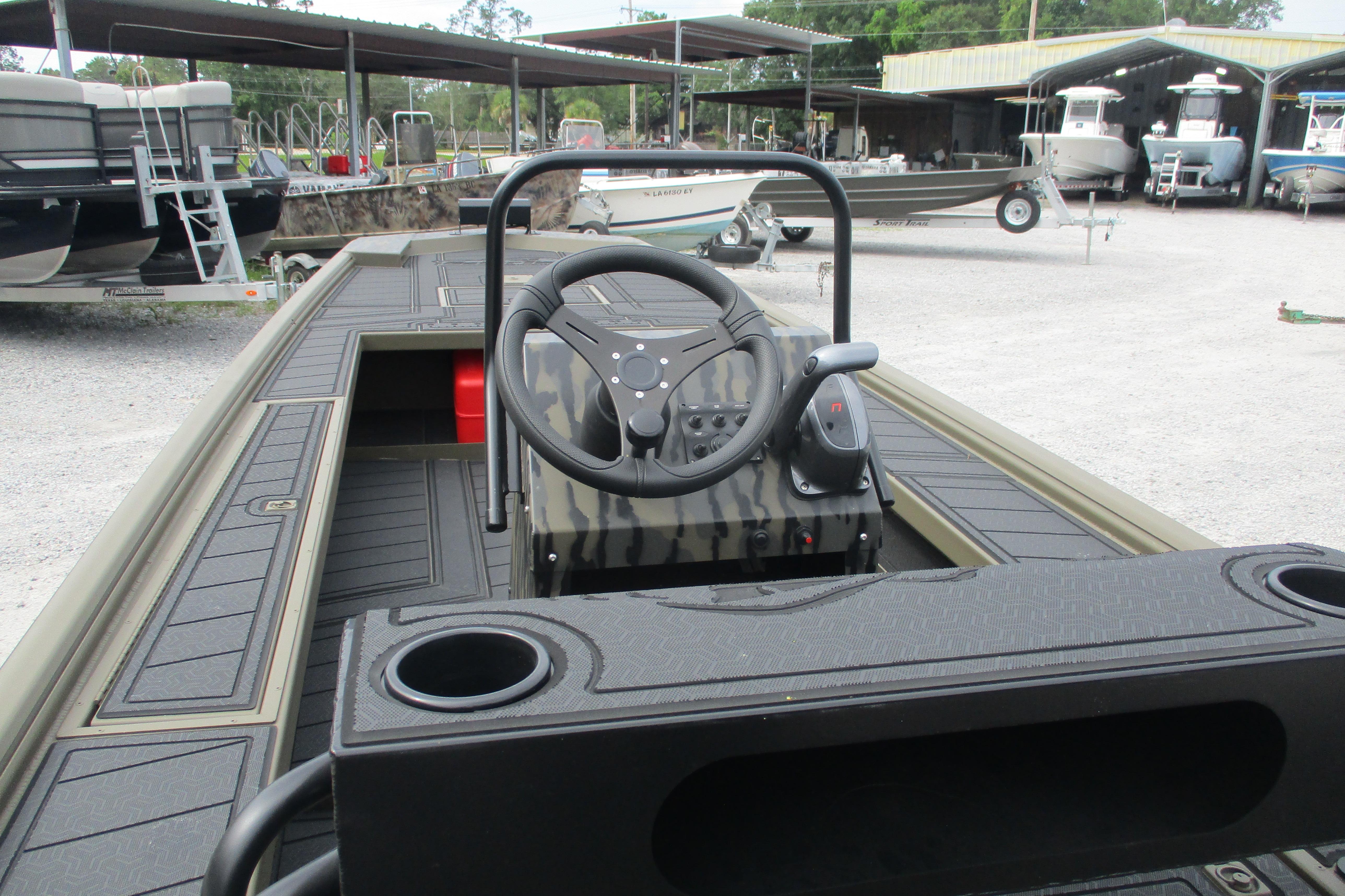 2026 Gator Tail 2060 Extreme CC boat interior with steering wheel and console.