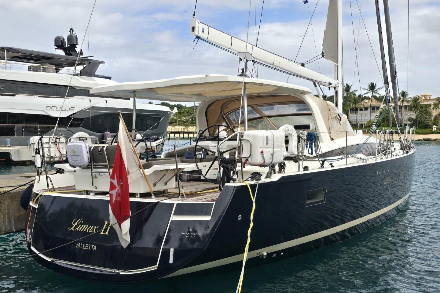 2023 Jeanneau 65 yacht docked, featuring sleek design and modern amenities.