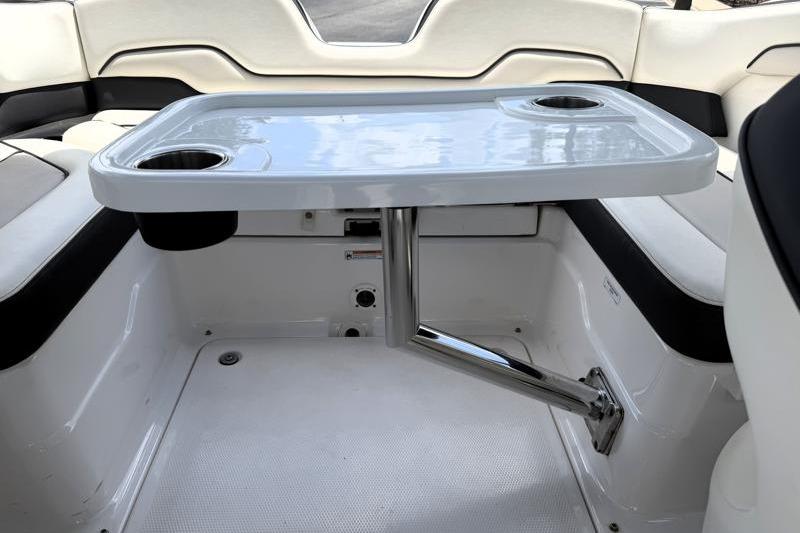 2017 Yamaha SX210 boat interior with table and cup holders.