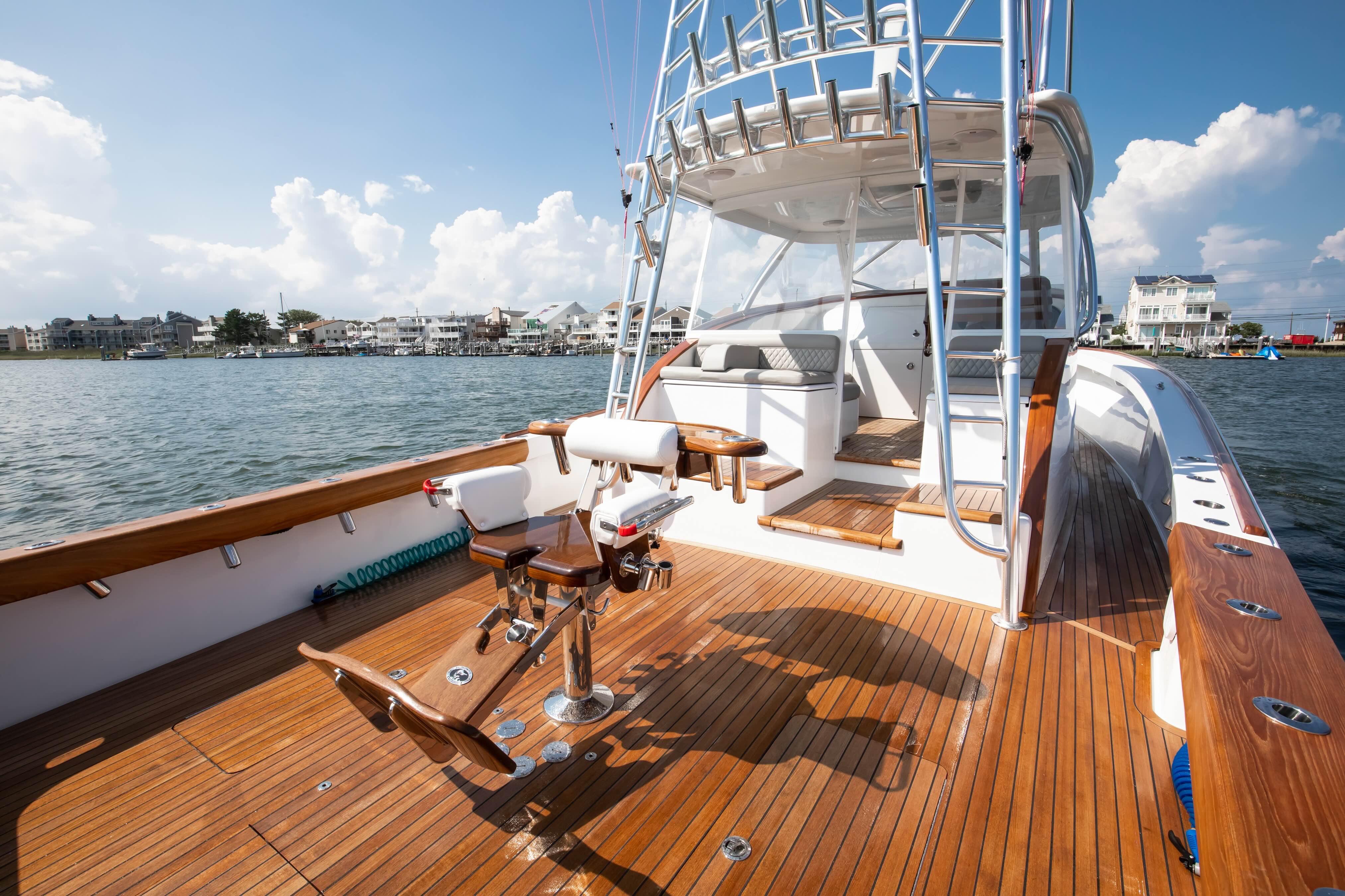 2026 Release Boatworks 46 Walkaround with teak deck, fishing chair, and ocean view.