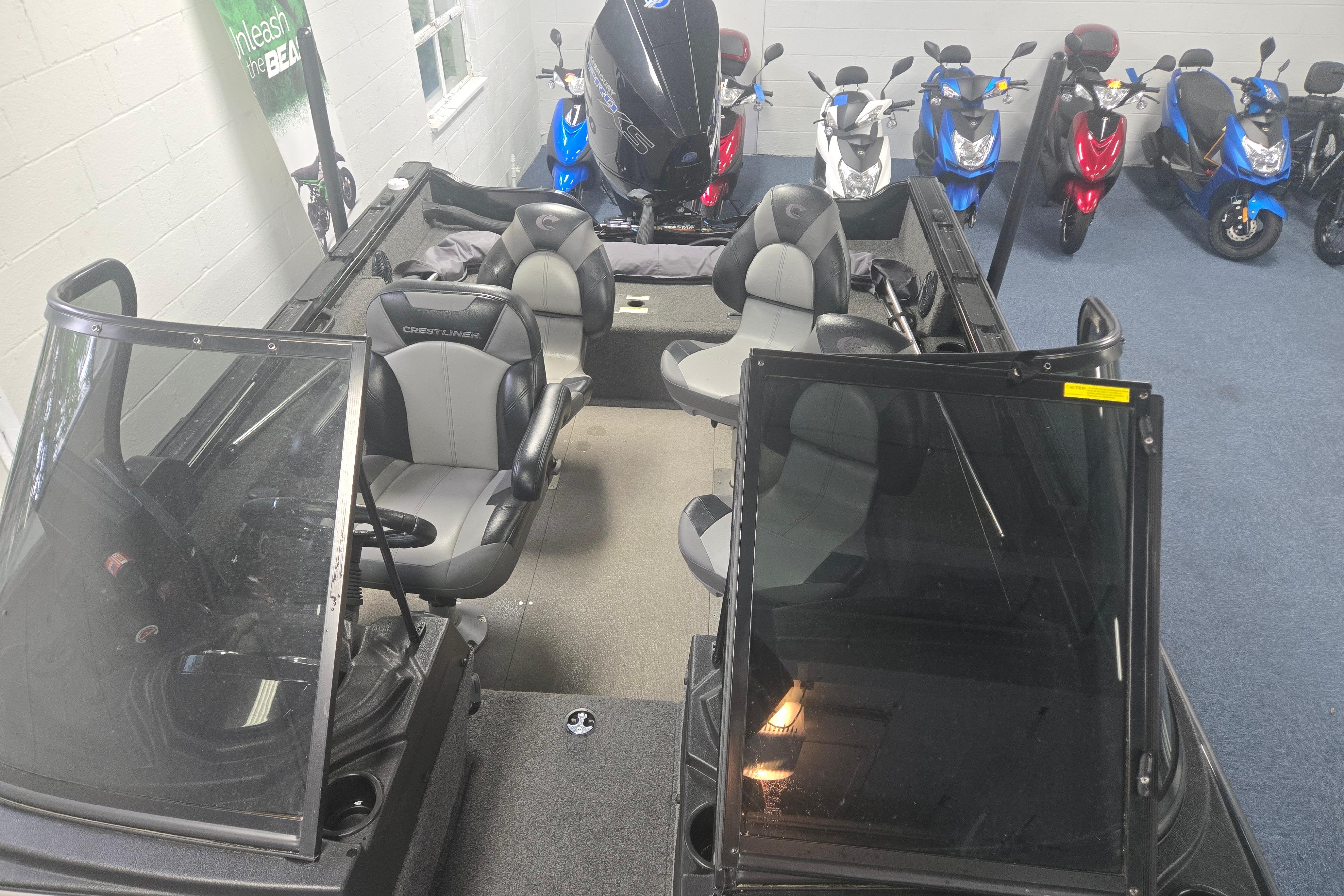 2020 Crestliner 1850 Raptor WT boat interior with seating, displayed indoors.