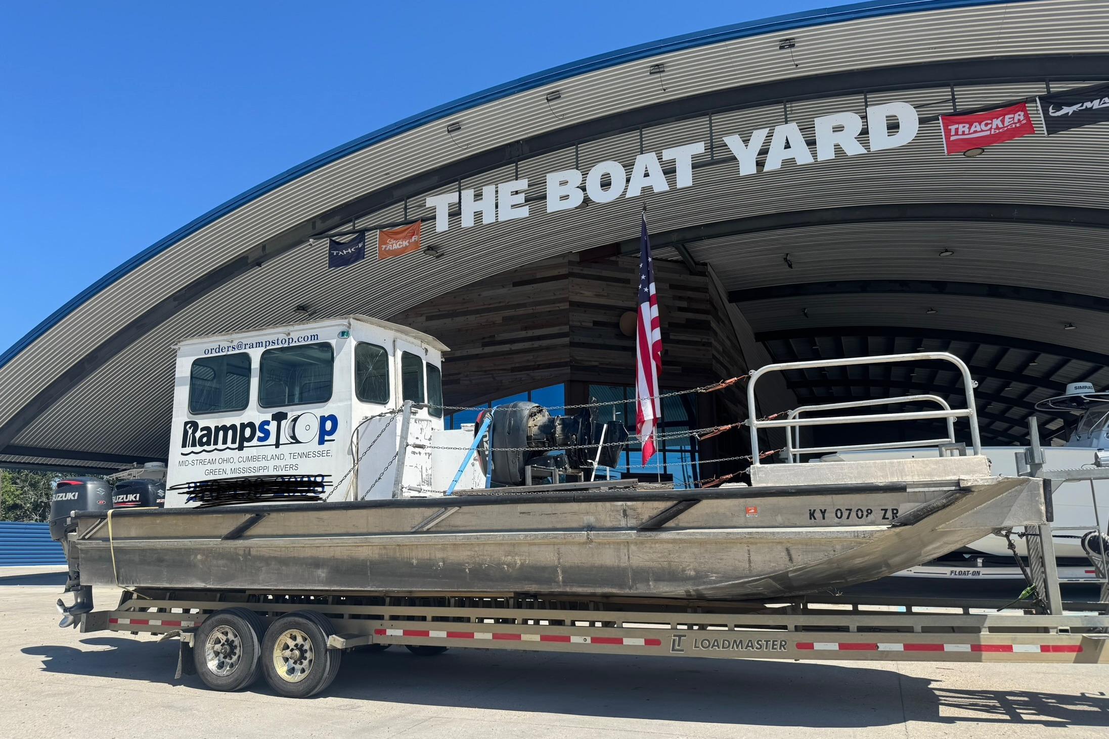 Custom Aluminum Work Boat 33, 2010, on trailer at The Boat Yard.