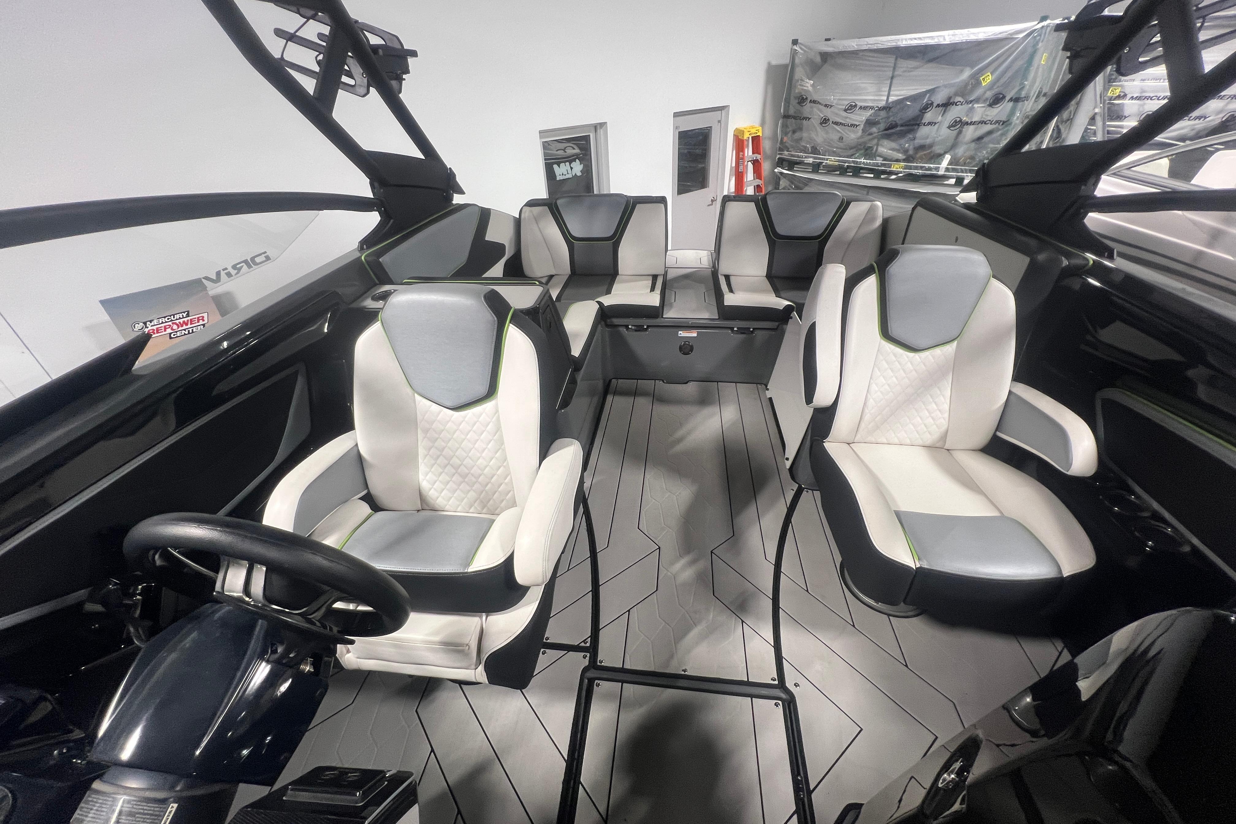 Interior of 2021 Yamaha Boats 255XD, featuring modern seating and sleek design.
