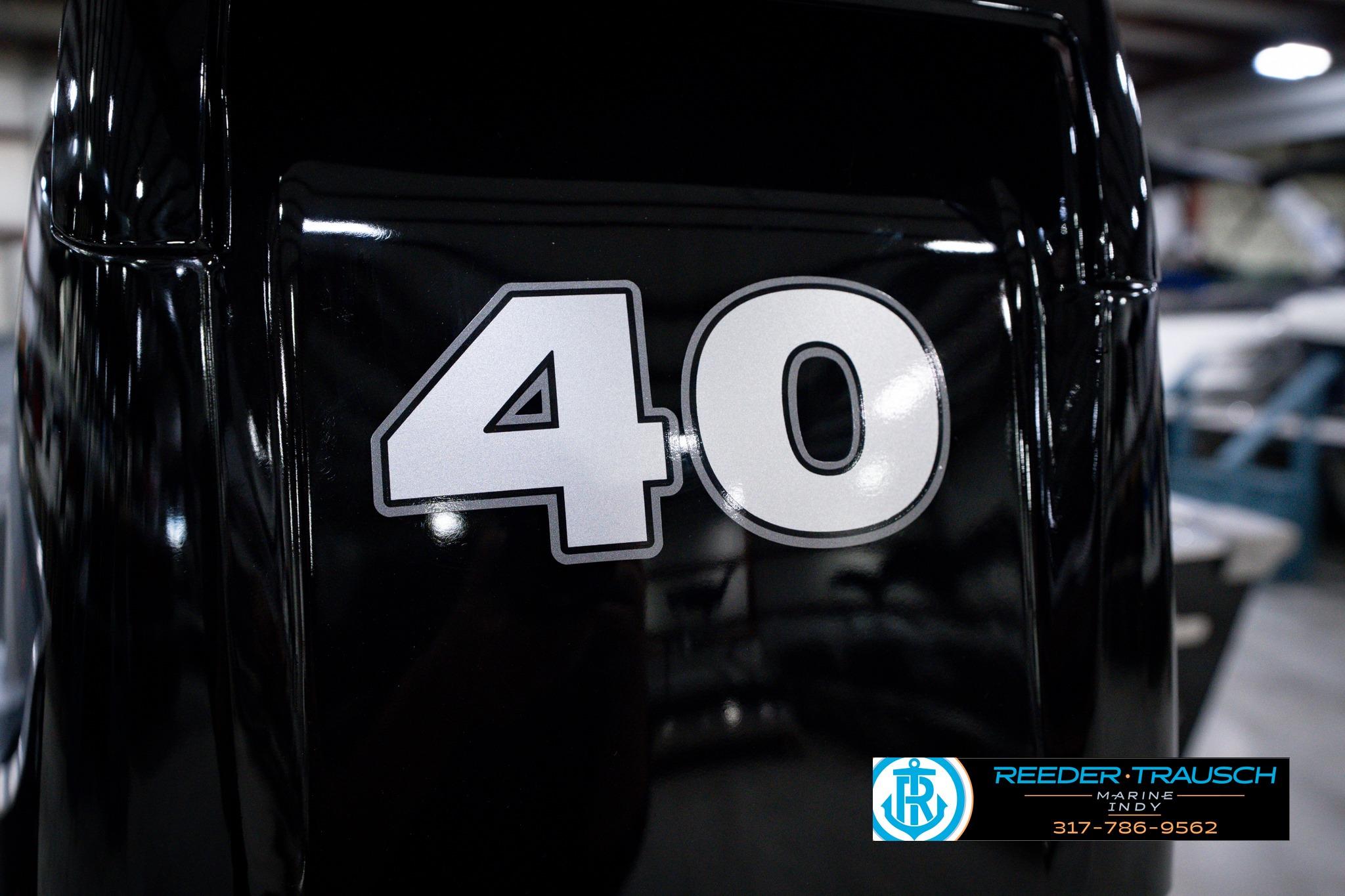 Close-up of 2026 Lund 1600 Fury SS boat engine with number 40 decal.