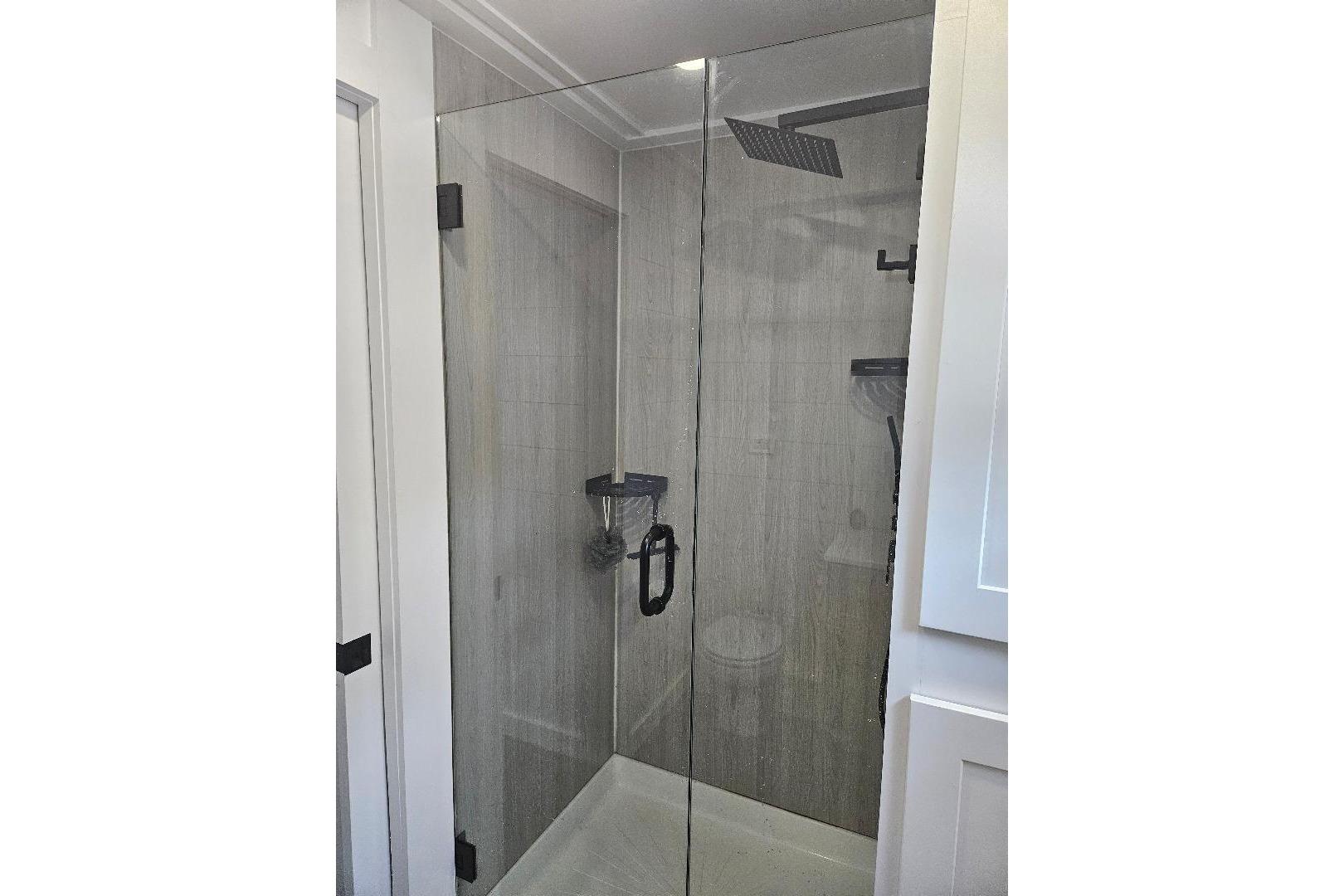 Modern glass shower in 2021 East Coast Houseboats Freedom 40 model.