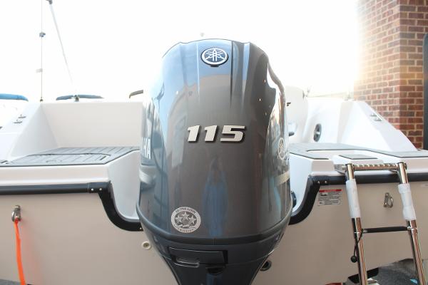 2024 Starcraft 171 SVX boat with Yamaha 115 outboard motor, rear view.