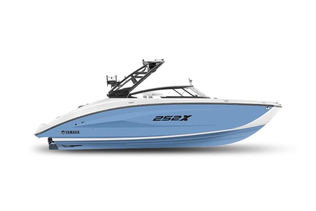2025 Yamaha Boats 252XE, sleek blue and white design, side view.