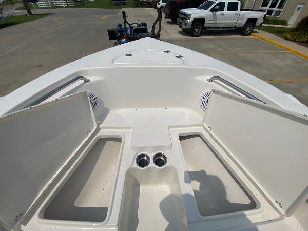 2024 Key West 203 FS boat interior with open storage compartments.