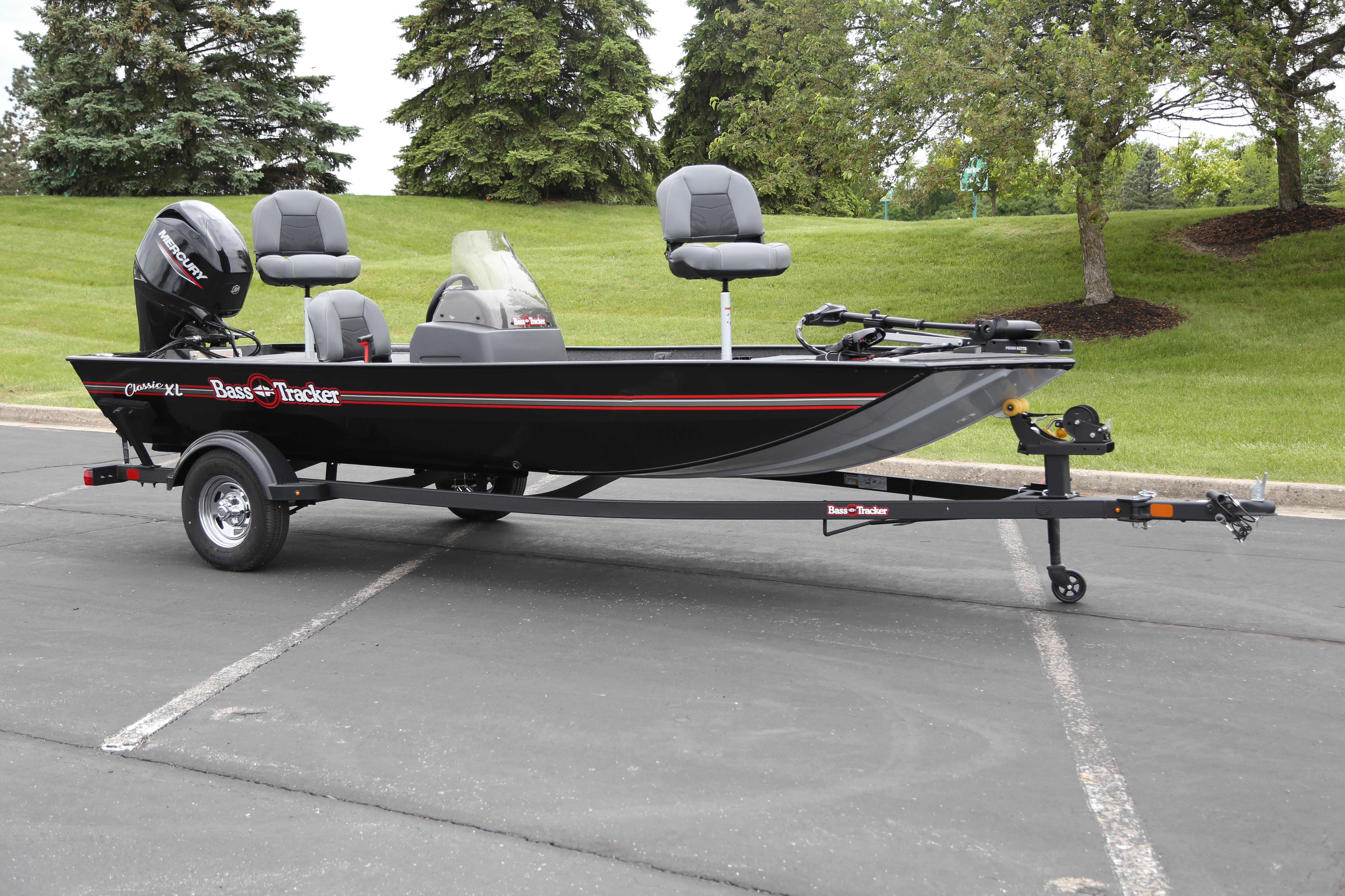 2026 Tracker Bass Tracker Classic XL boat on trailer, parked outdoors.