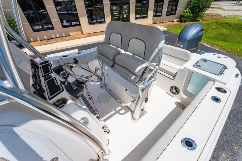 2021 Sea Fox 228 Commander boat interior with helm, seating, and Yamaha outboard motor.