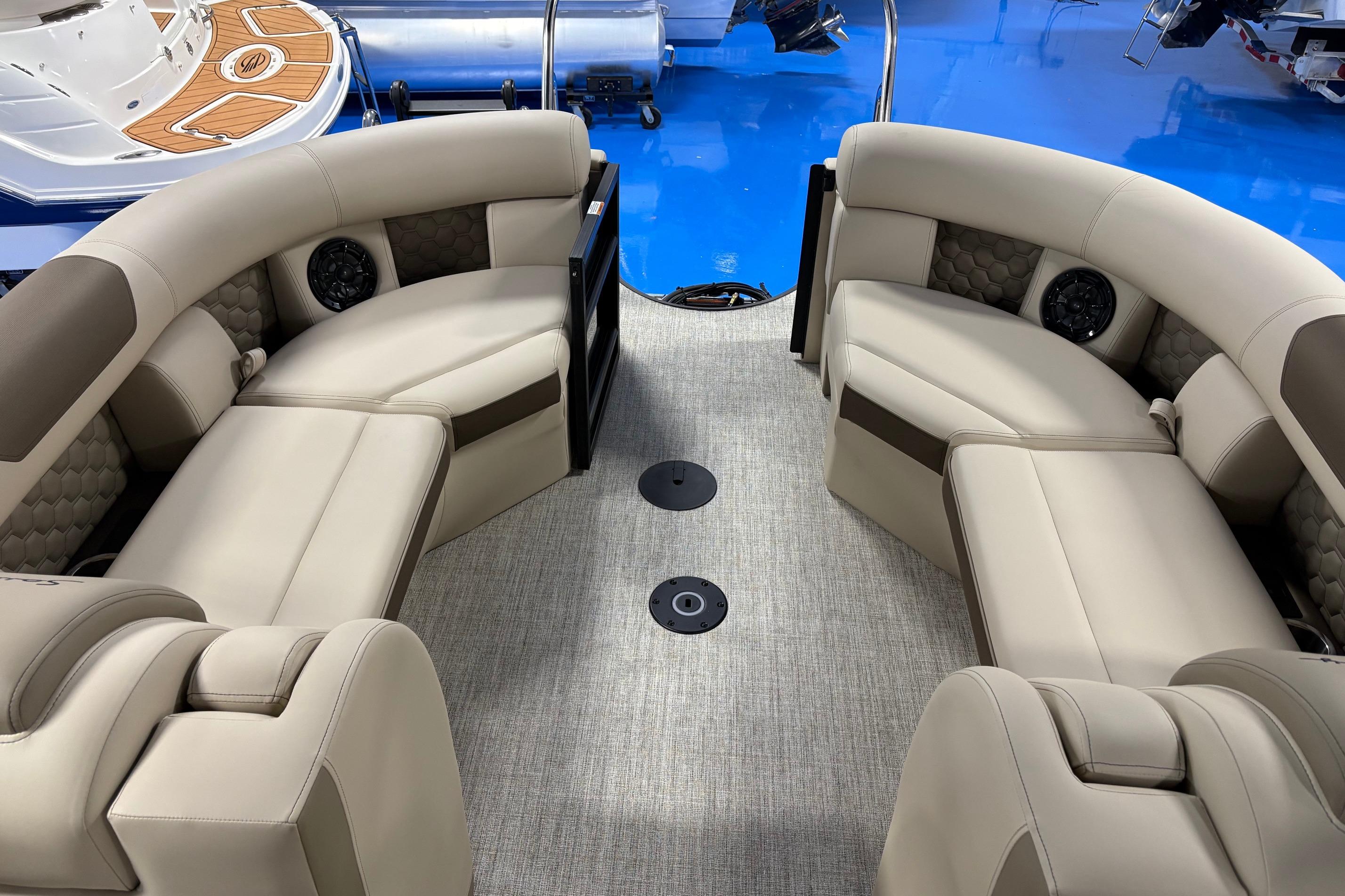 Luxurious interior of 2026 South Bay 523RS boat with plush seating and modern design.
