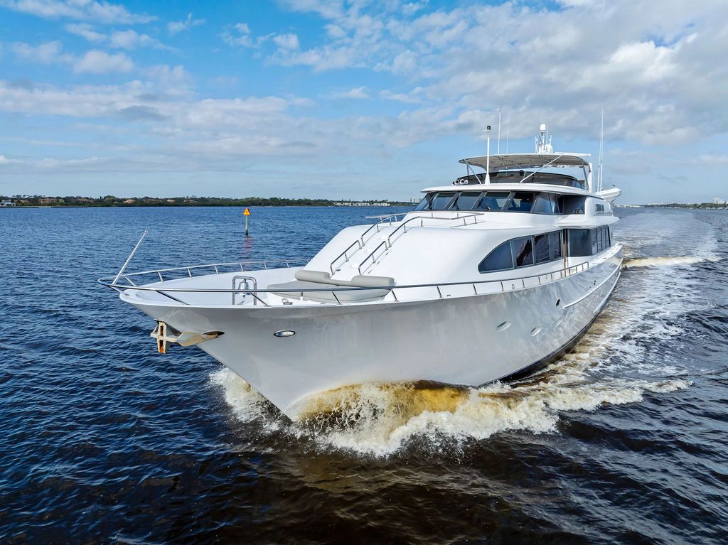 1999 Westport 112 luxury yacht cruising on open water.