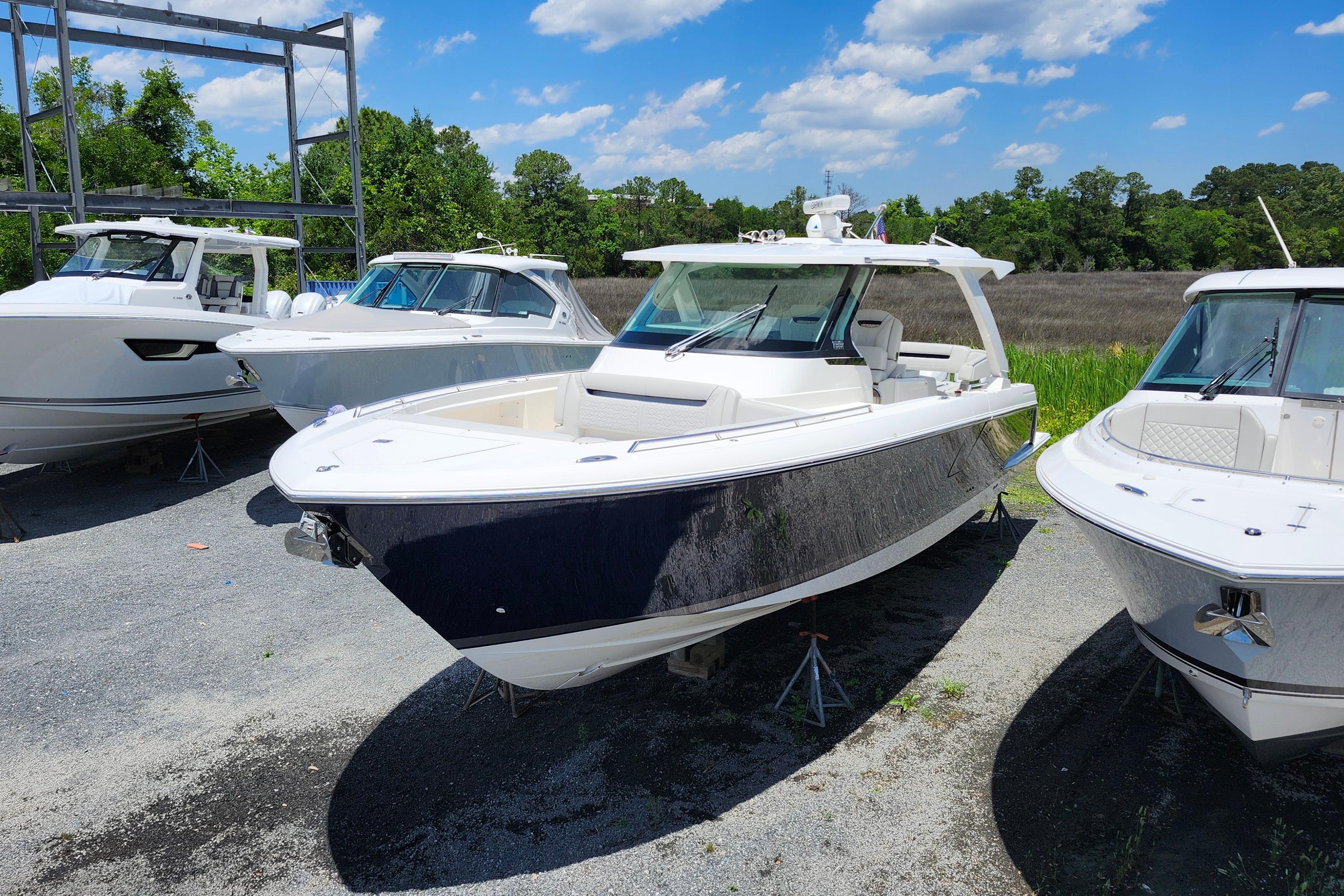 2022 Tiara Yachts 38 LS boat displayed outdoors on a sunny day.