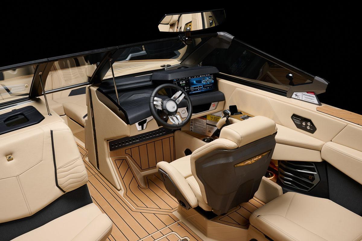 Manufacturer Provided Image: 2026 Nautique Super Air Nautique G23 interior with luxurious beige seating and advanced dashboard.