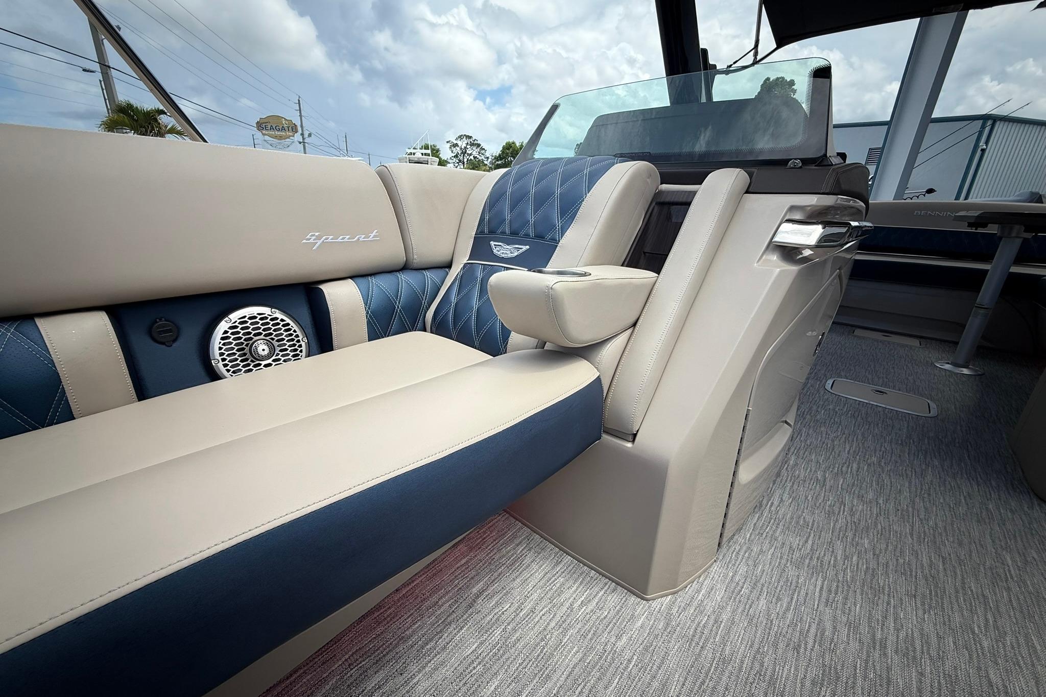 Luxurious interior of 2026 Bennington 27 QSBAT2 boat with plush seating and modern design.