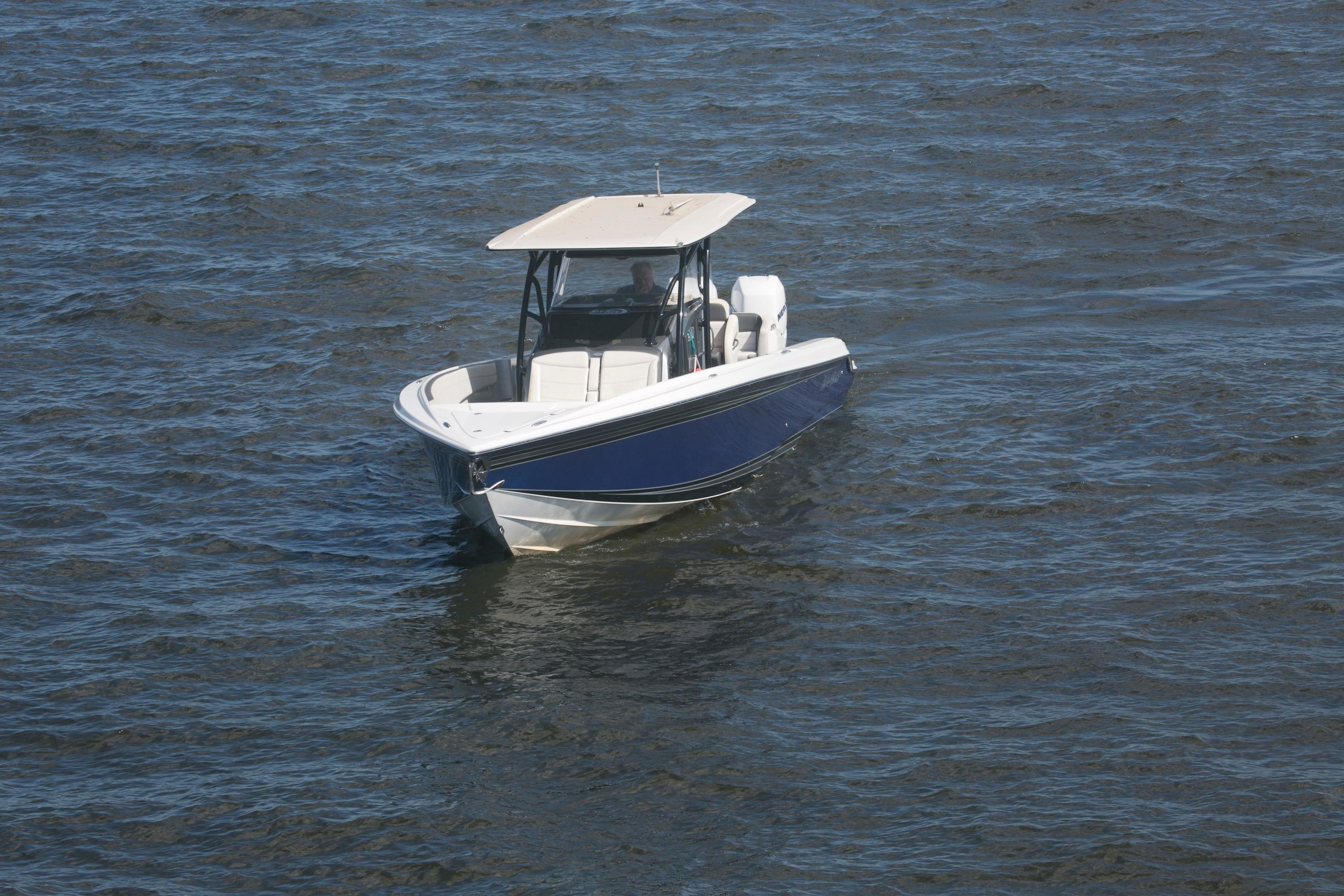 2018 Nor-Tech 340 Sport Center Console boat on open water.