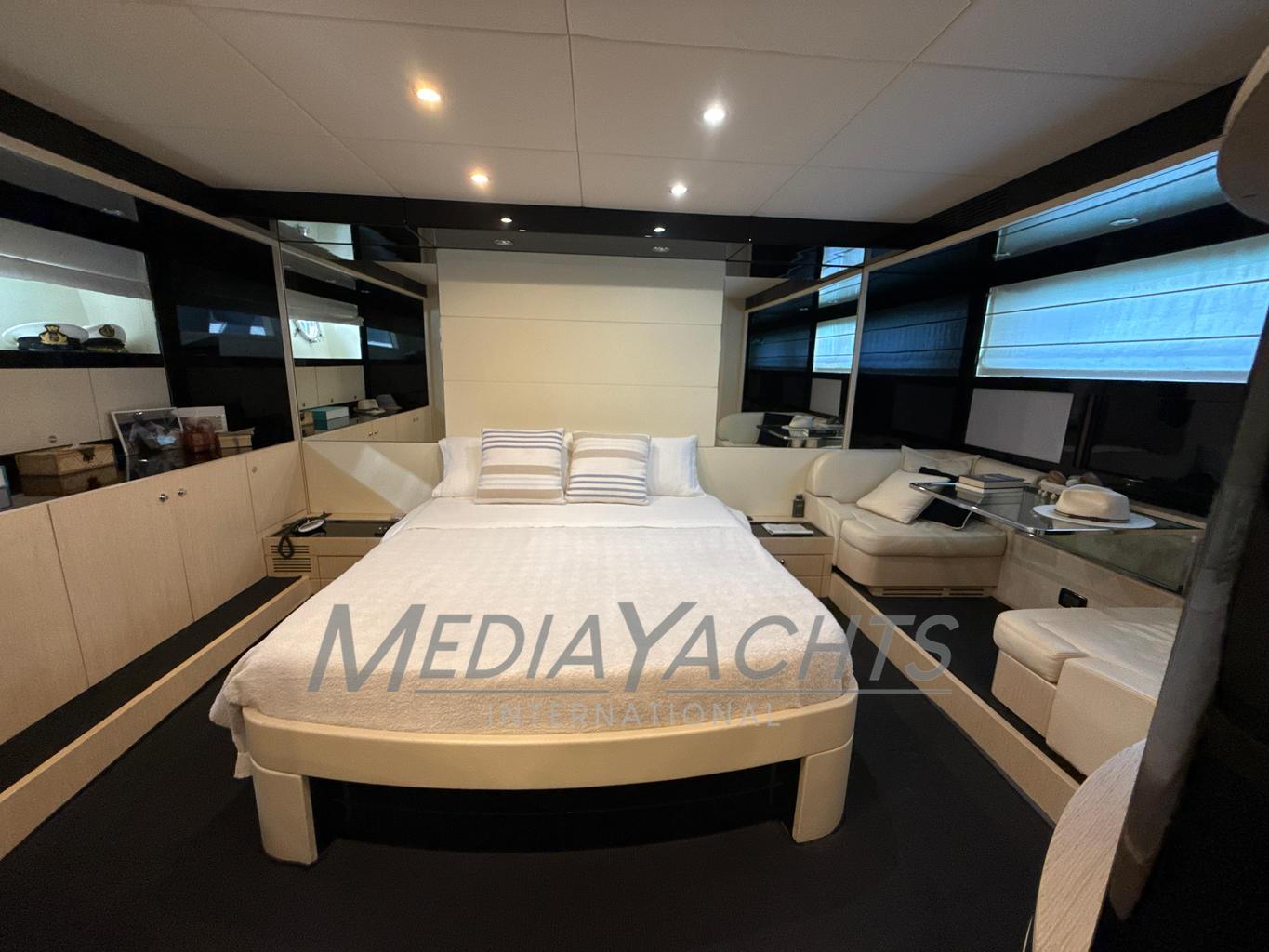 Luxurious bedroom interior of 2007 Riva Venere 75 yacht with modern furnishings.