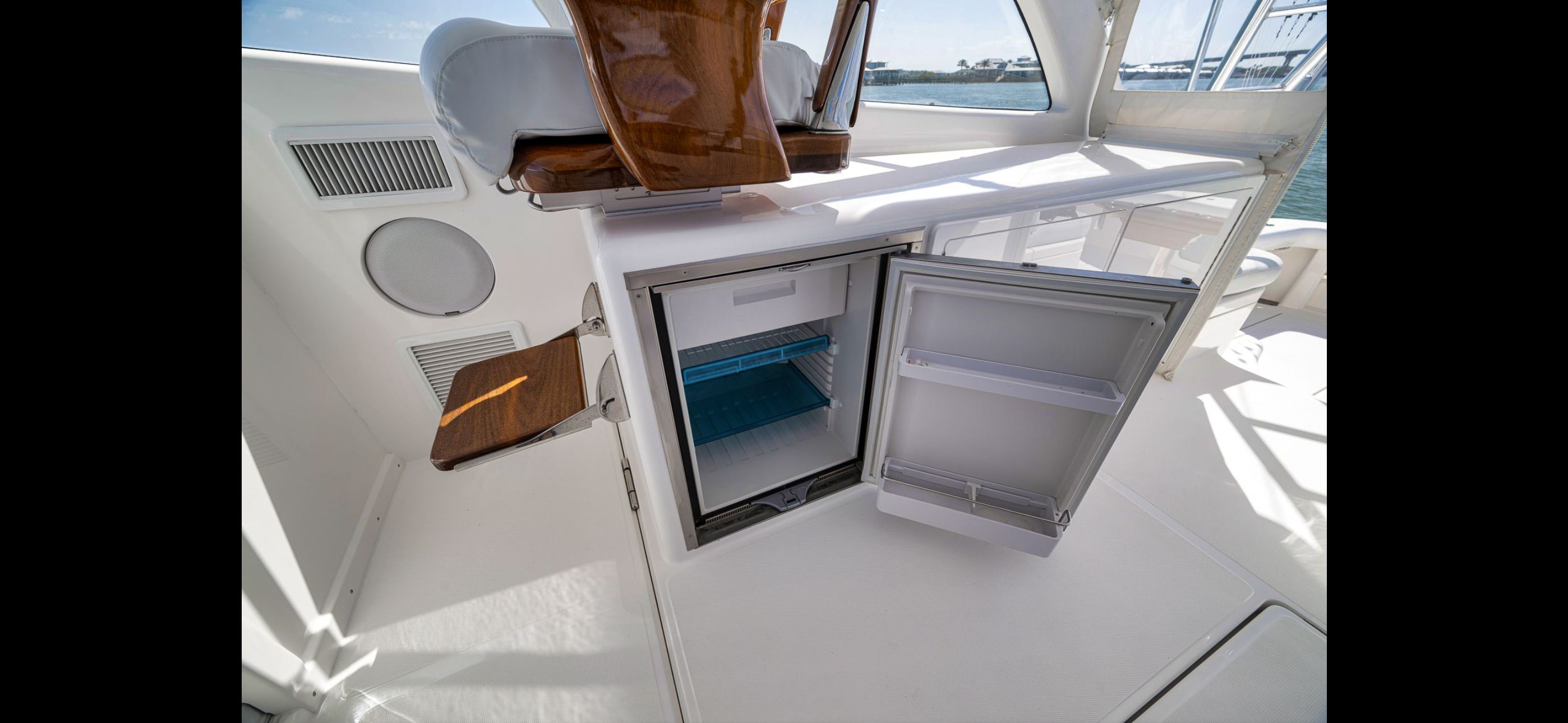Open fridge on Mag Bay 42 Express yacht, year 2022.