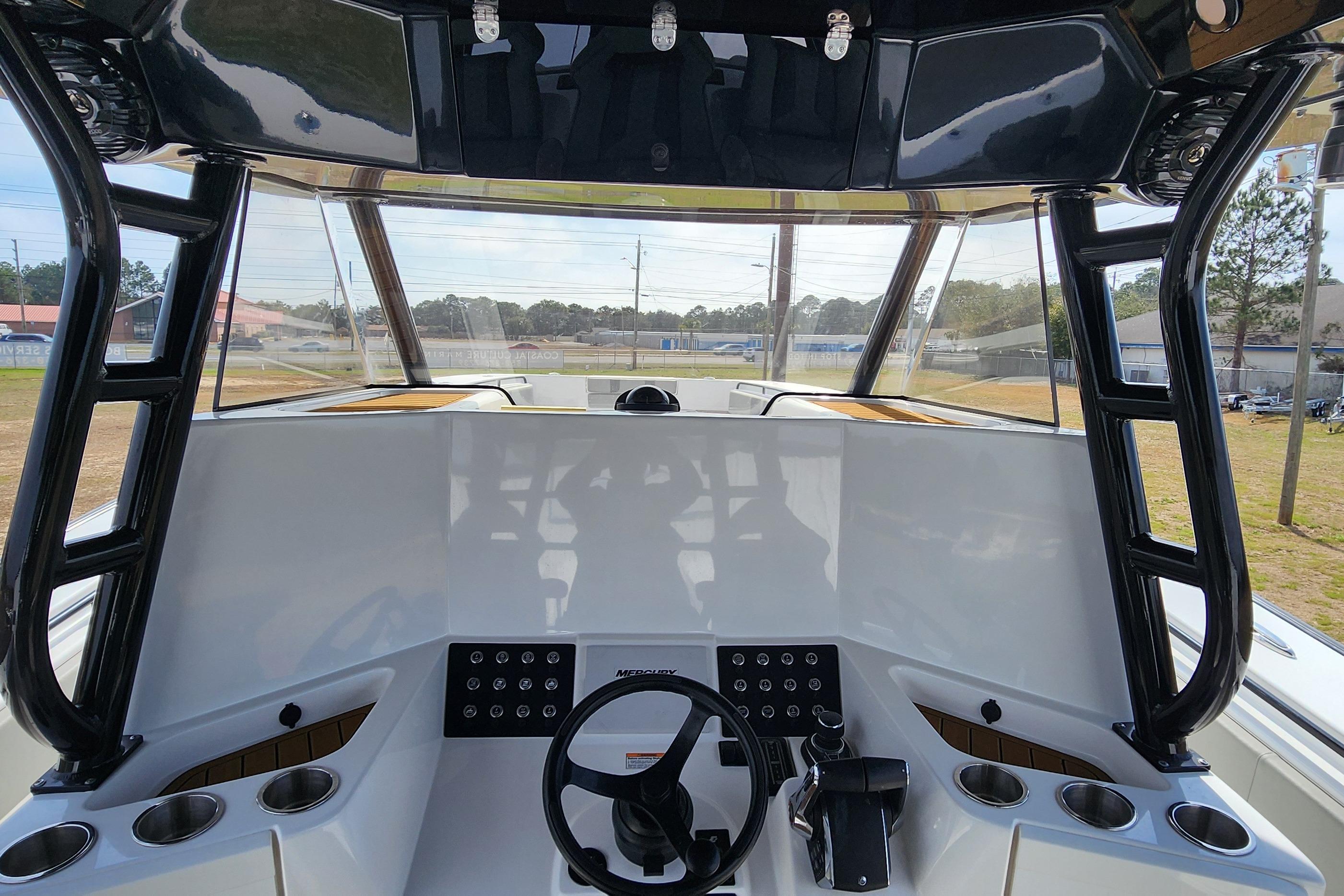 Cockpit of 2025 Cape Horn Yachts 47, featuring modern controls and steering wheel.