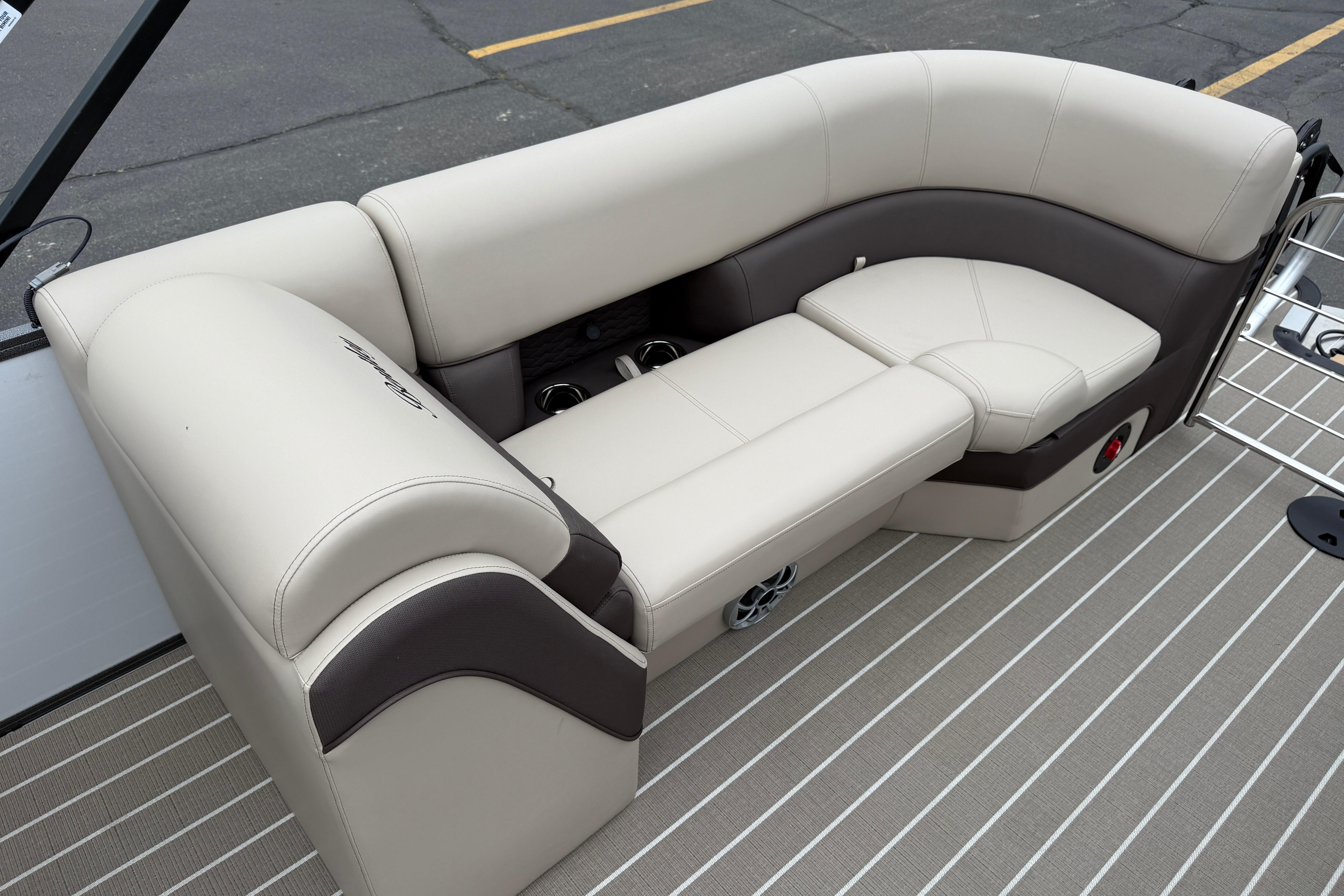 2026 Bentley Pontoons Elite 253 Admiral, luxurious seating with beige and brown upholstery.