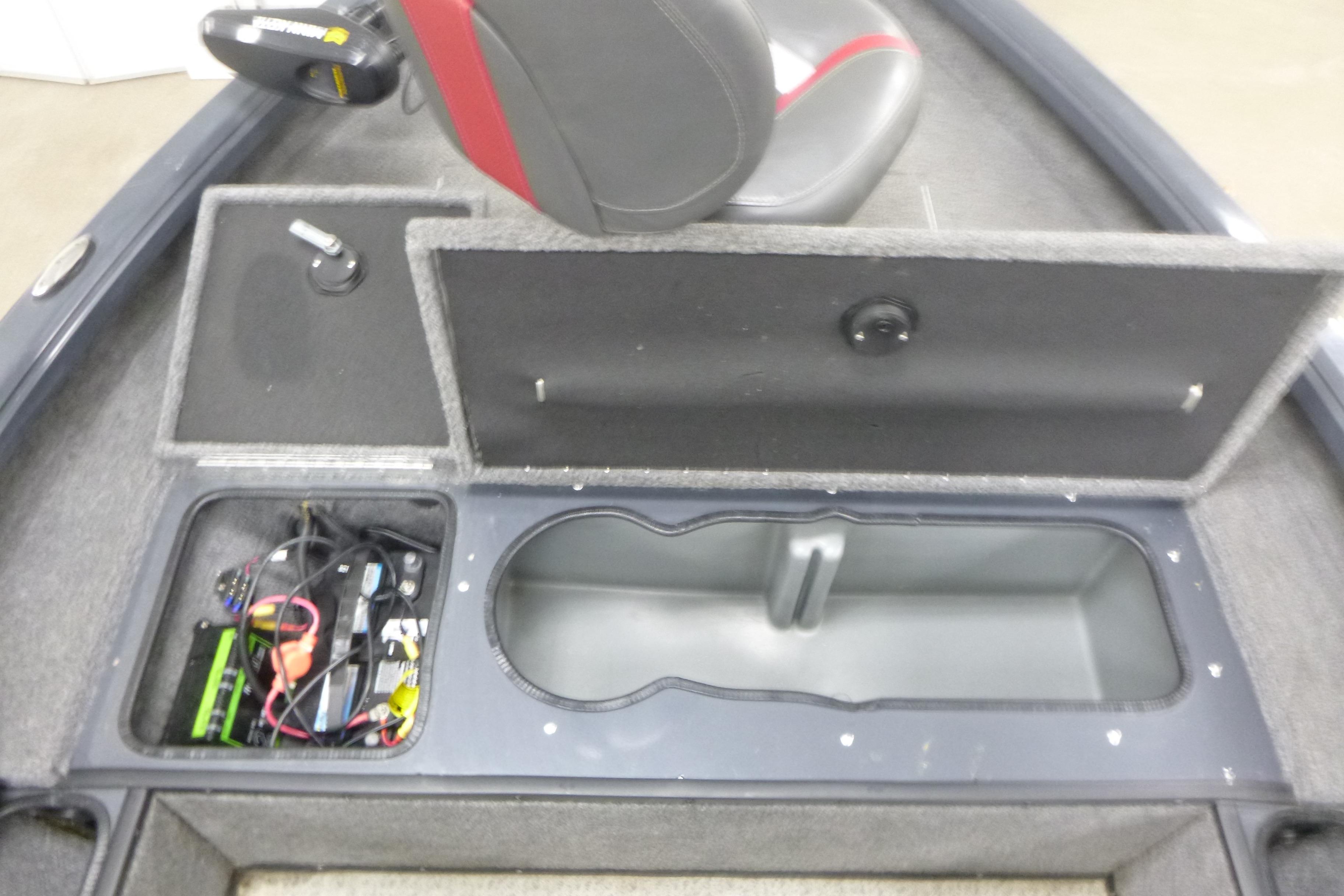 2021 Ranger VS1660 T boat interior with open storage compartments and seat.