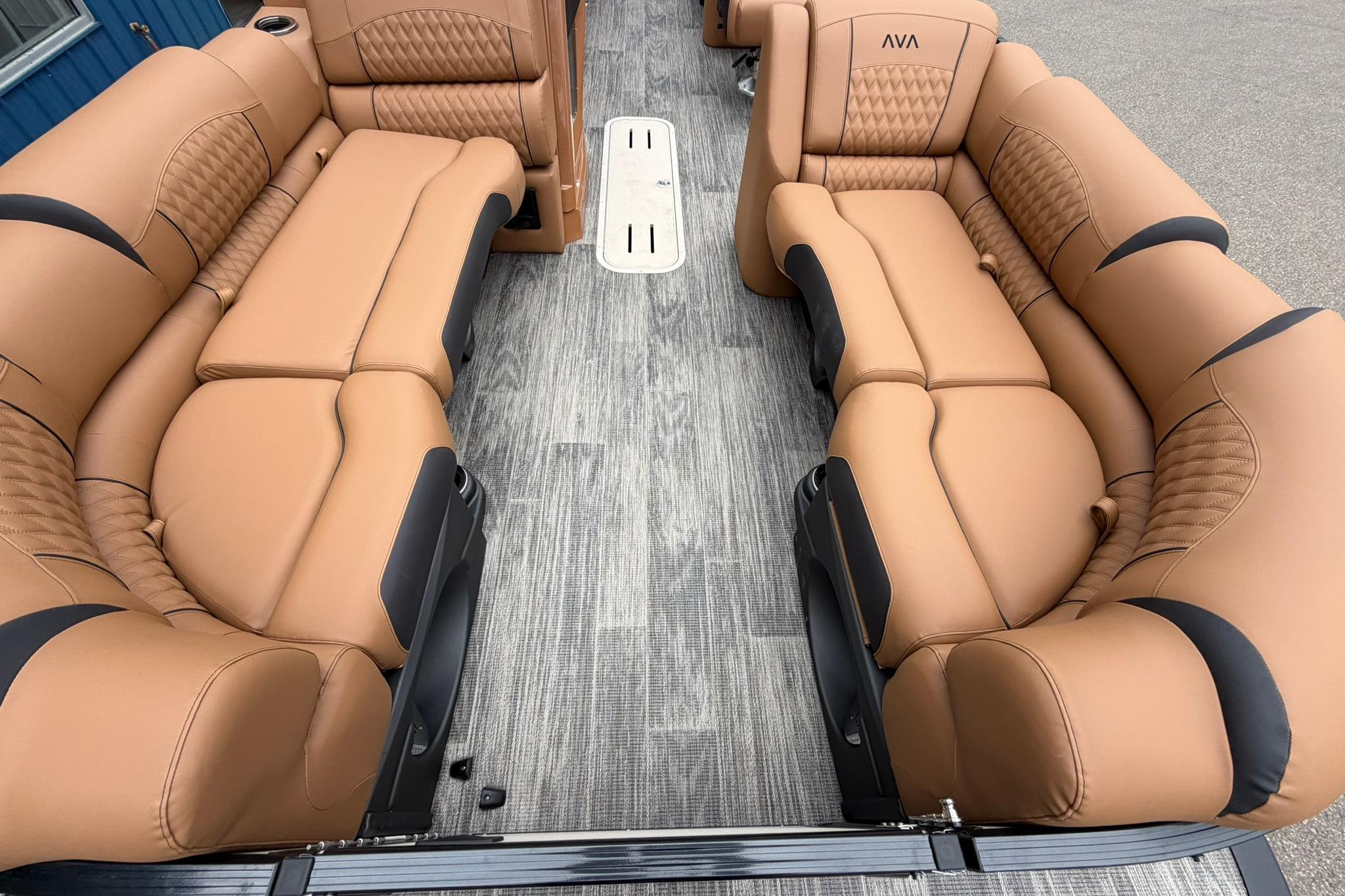 Luxurious tan seating on 2026 Avalon Catalina Quad Lounge Shift pontoon boat.