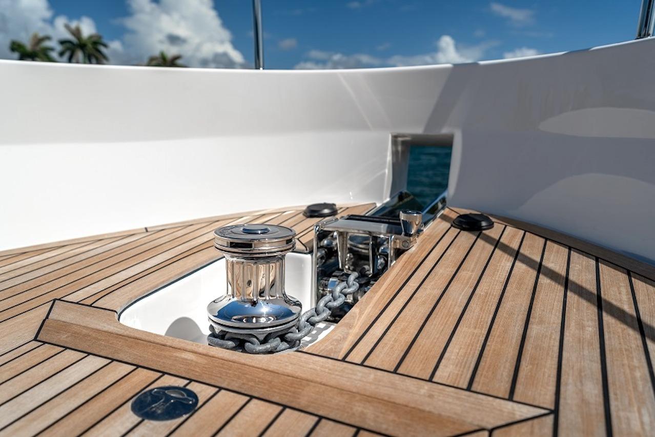Deck of 2027 Offshore Yachts 70 CE with anchor chain and winch system.