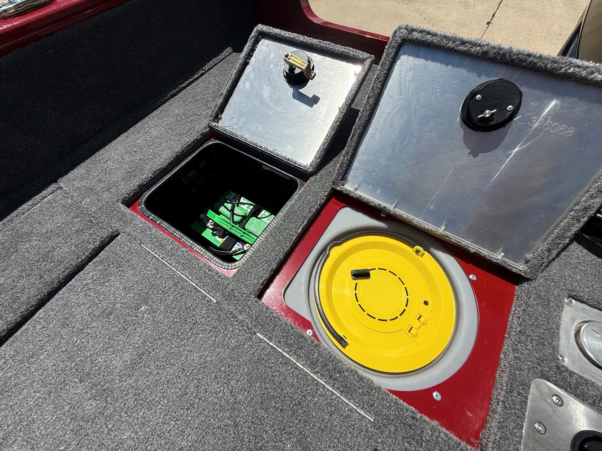 Tracker Pro Guide V175 2024 boat battery compartment and storage.