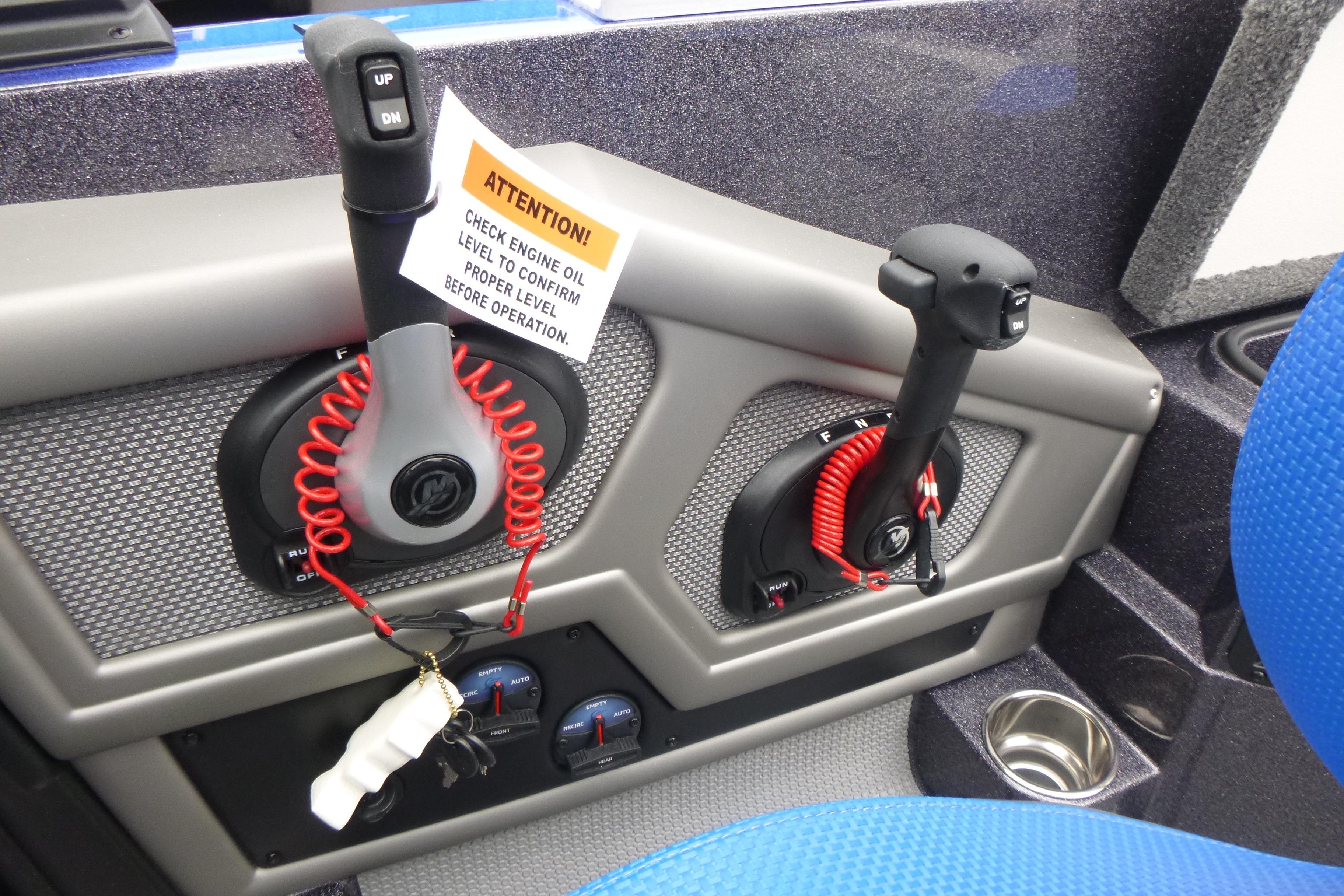 Control panel of 2026 Ranger 620FS Cup Equipped boat with safety warning.