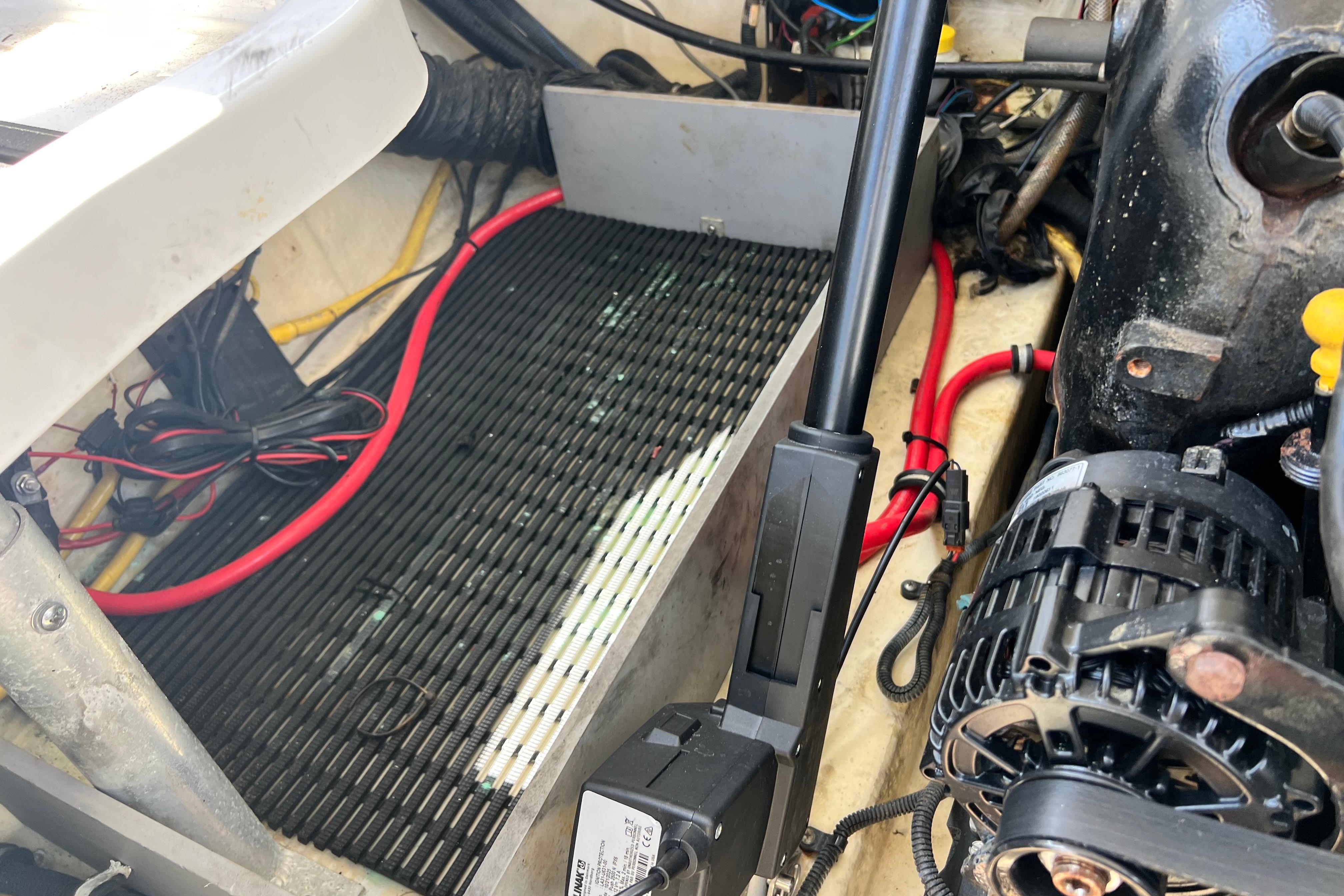 Engine compartment of a 2015 Monterey 268SS Super Sport boat, showing wiring and components.