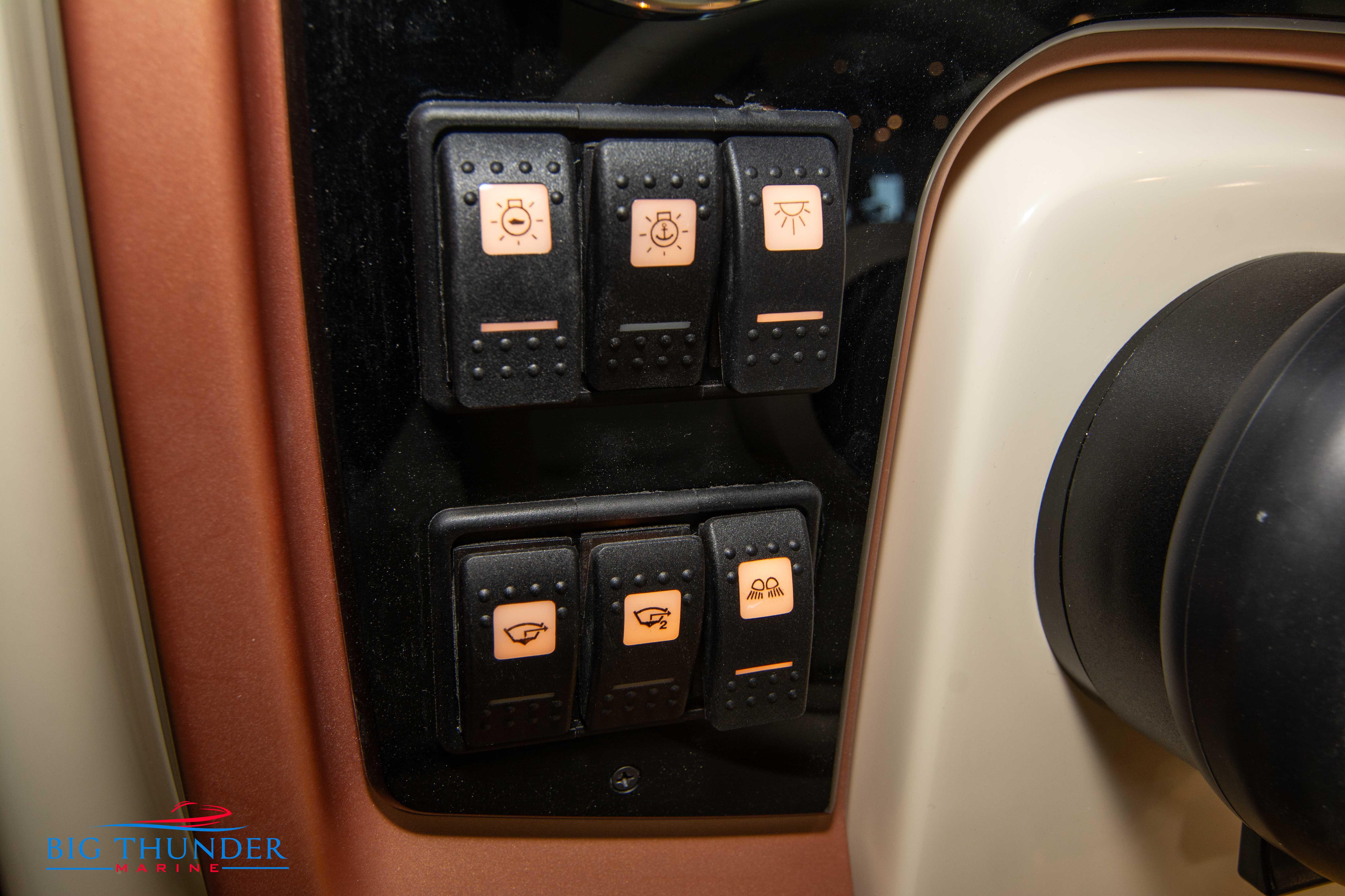 Control panel of 2024 Capoforte SX280I boat with various switches.