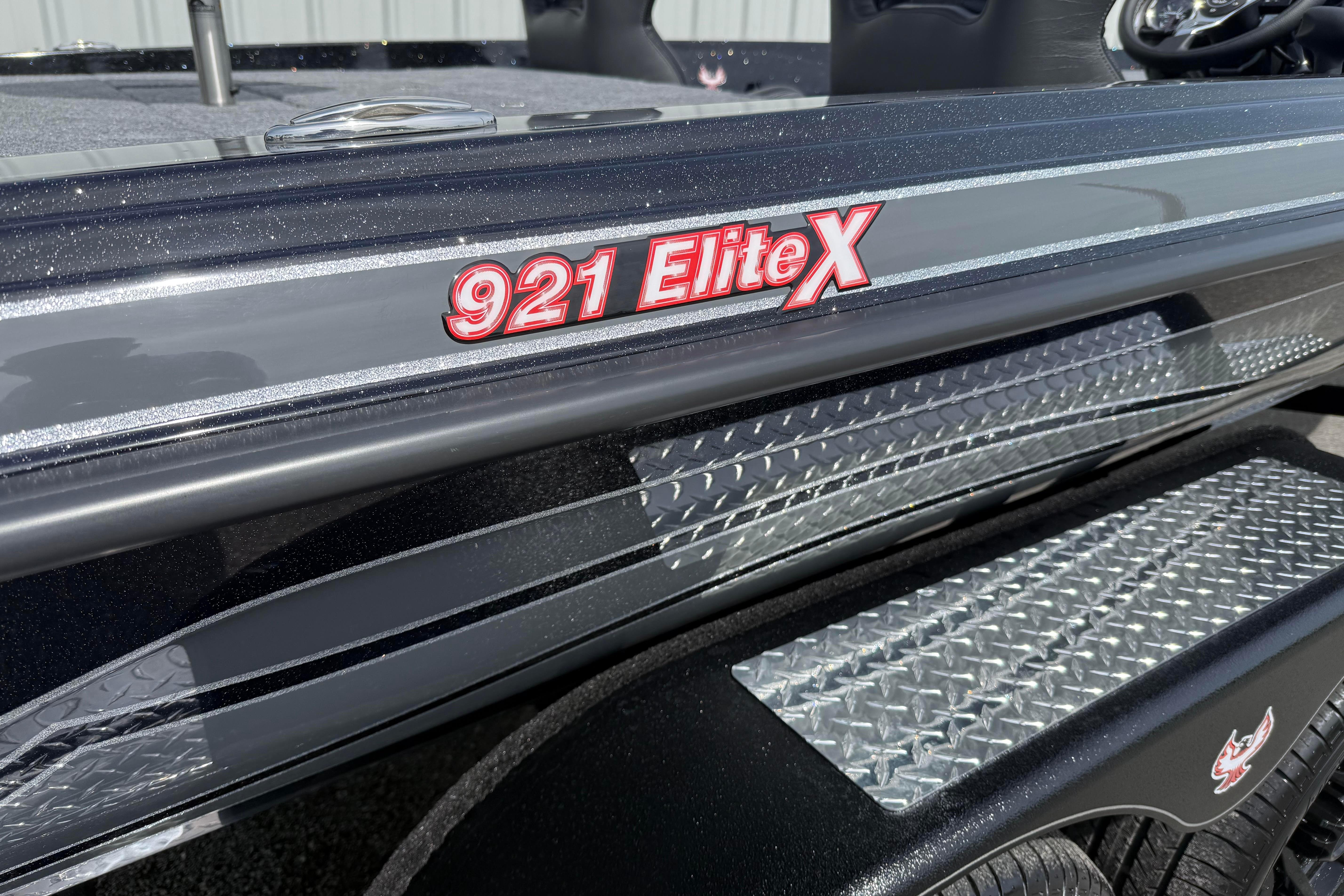2027 Phoenix 921 Elite X boat with sleek design and metallic accents.