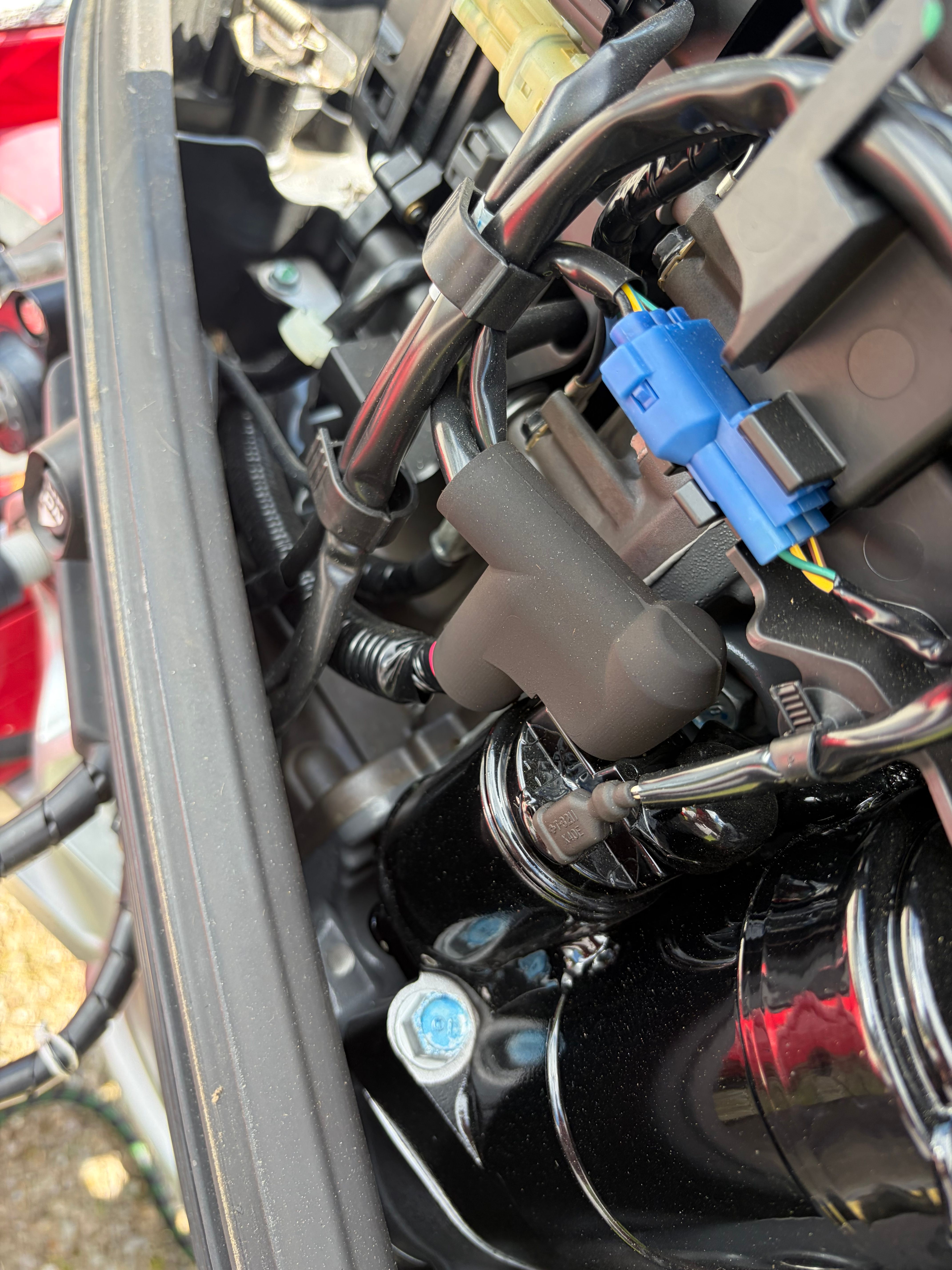 Close-up of engine components in a 2024 Polar Kraft Outlander 2010.