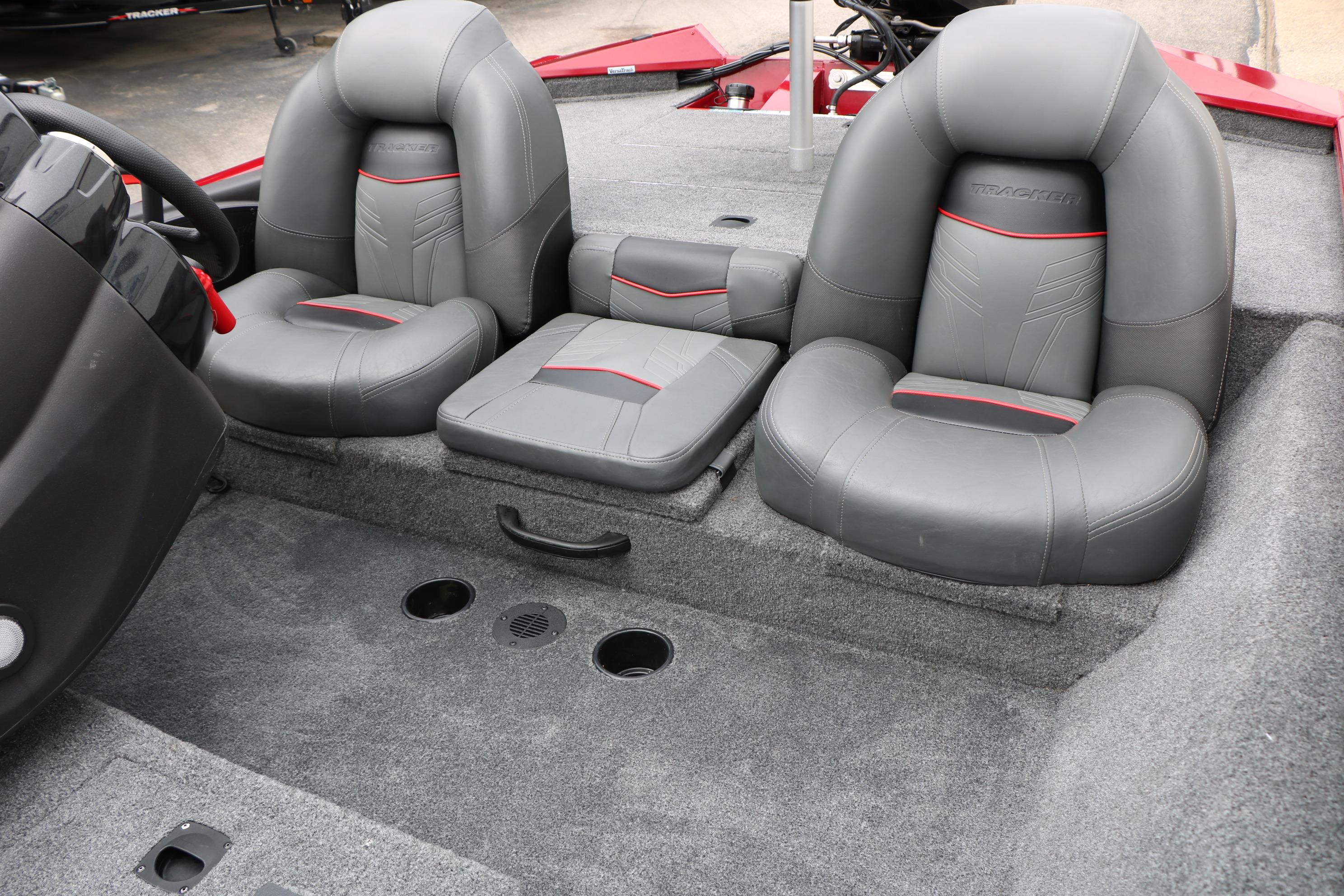 2024 Tracker Pro Team 175 boat interior with gray seating and red accents.